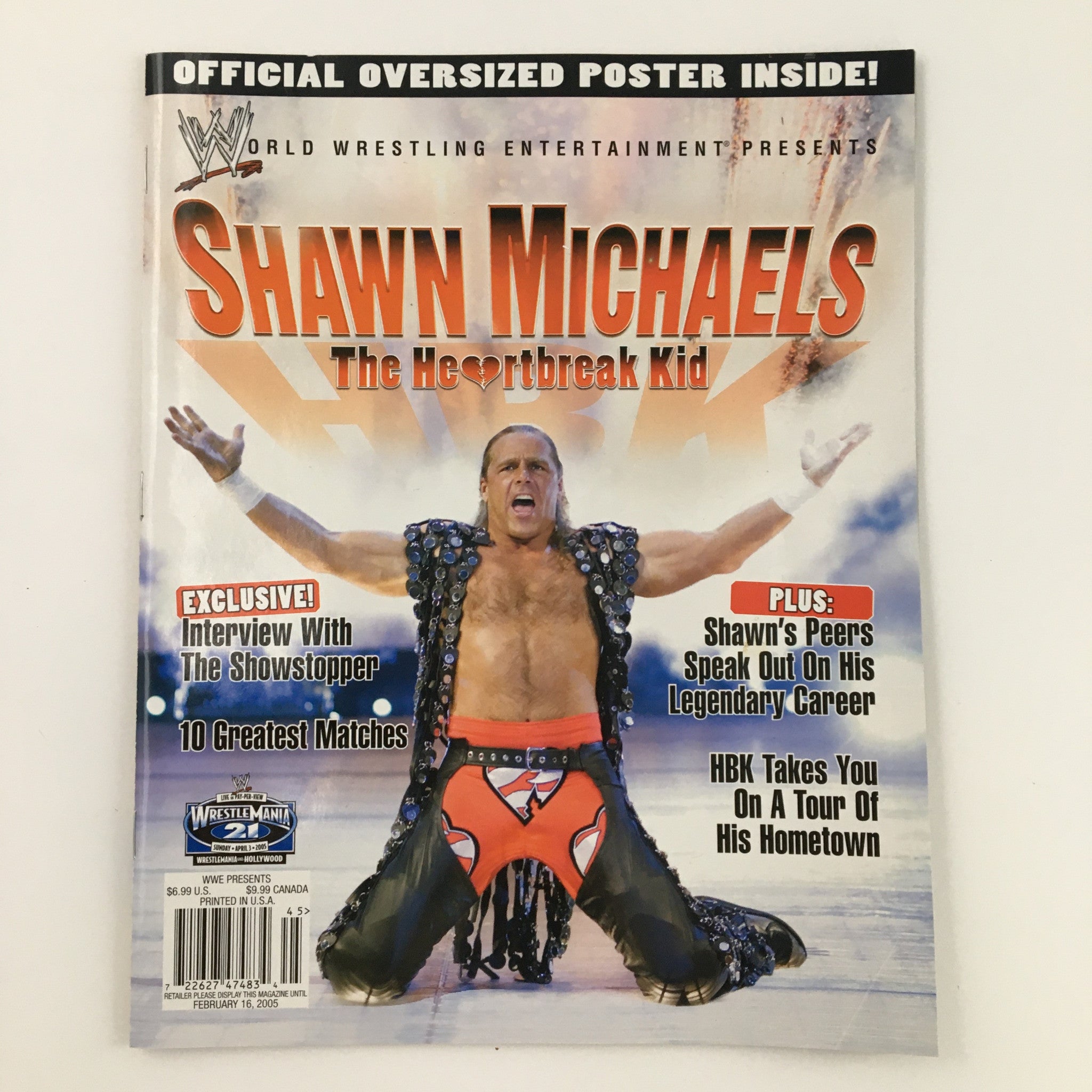 WWE Presents February 2005 Shawn Michaels The Heartbreak Kid magazine cover featuring Shawn Michaels in wrestling attire with a promotional announcement for interviews and features.