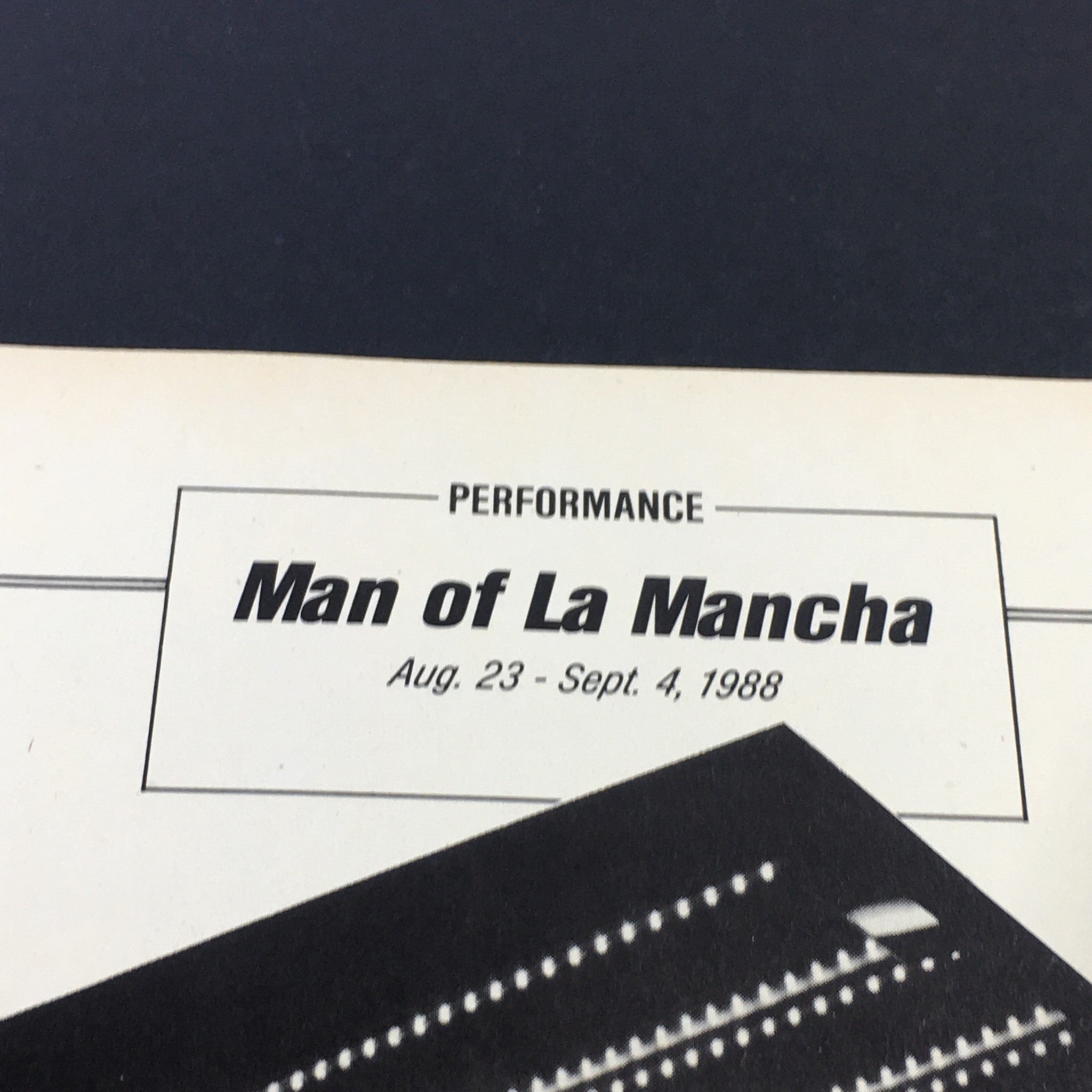 Interior page of the VTG Performance Theatre Magazine displaying the title 'Man of La Mancha' along with the performance dates of August 23 to September 4, 1988. This detail provides insight into the theater's promotional materials.