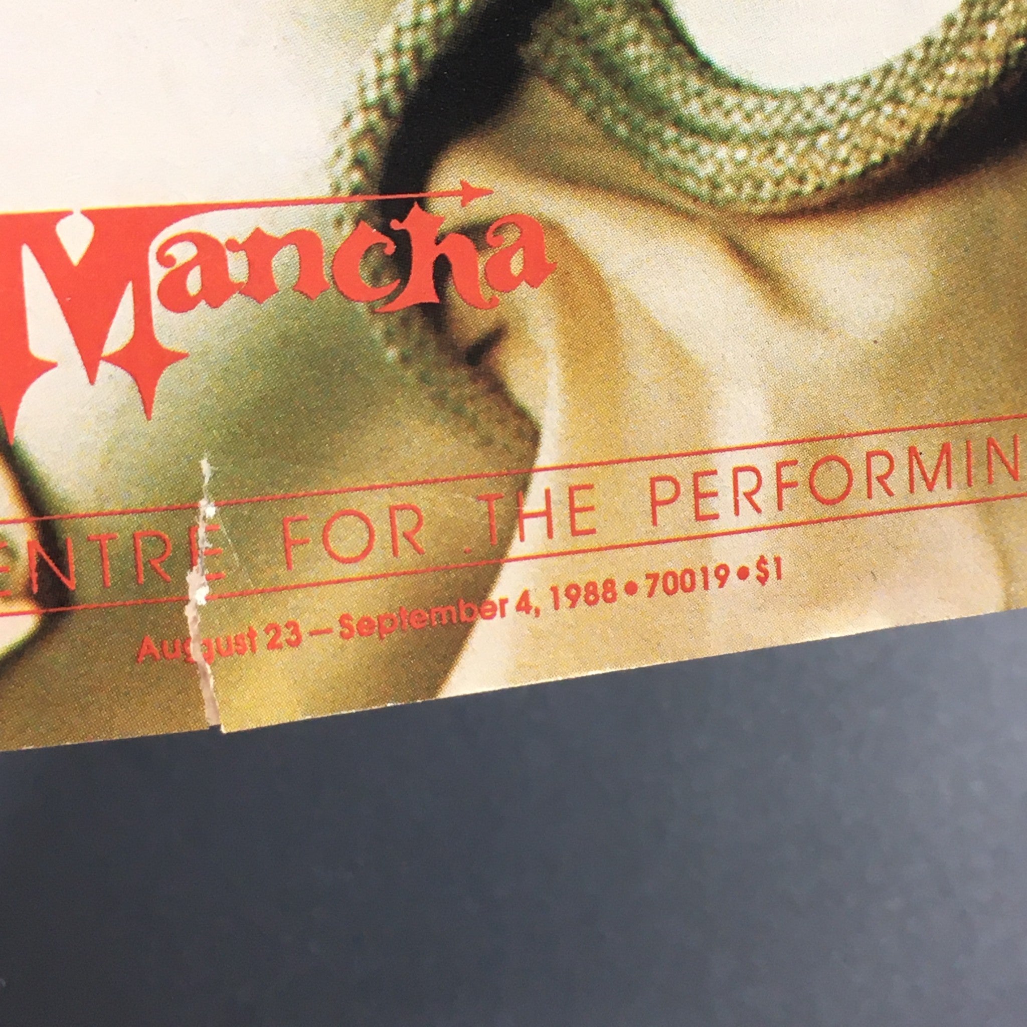 Close-up of the corner of the VTG Performance Theatre Magazine August 23-September 4 1988, featuring the title 'Man of La Mancha' and publication dates.