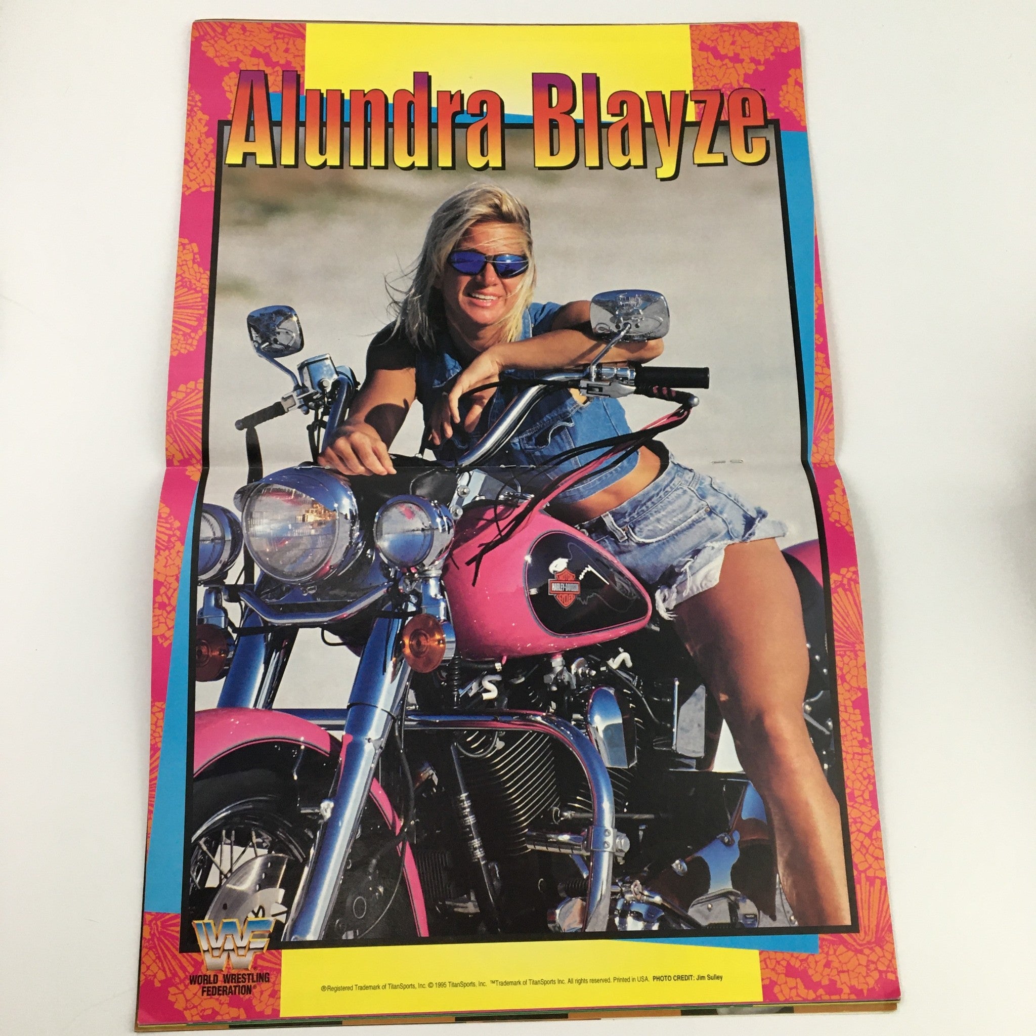 WWF Magazine August 1995 fold-out poster featuring Alundra Blayze on a motorcycle.