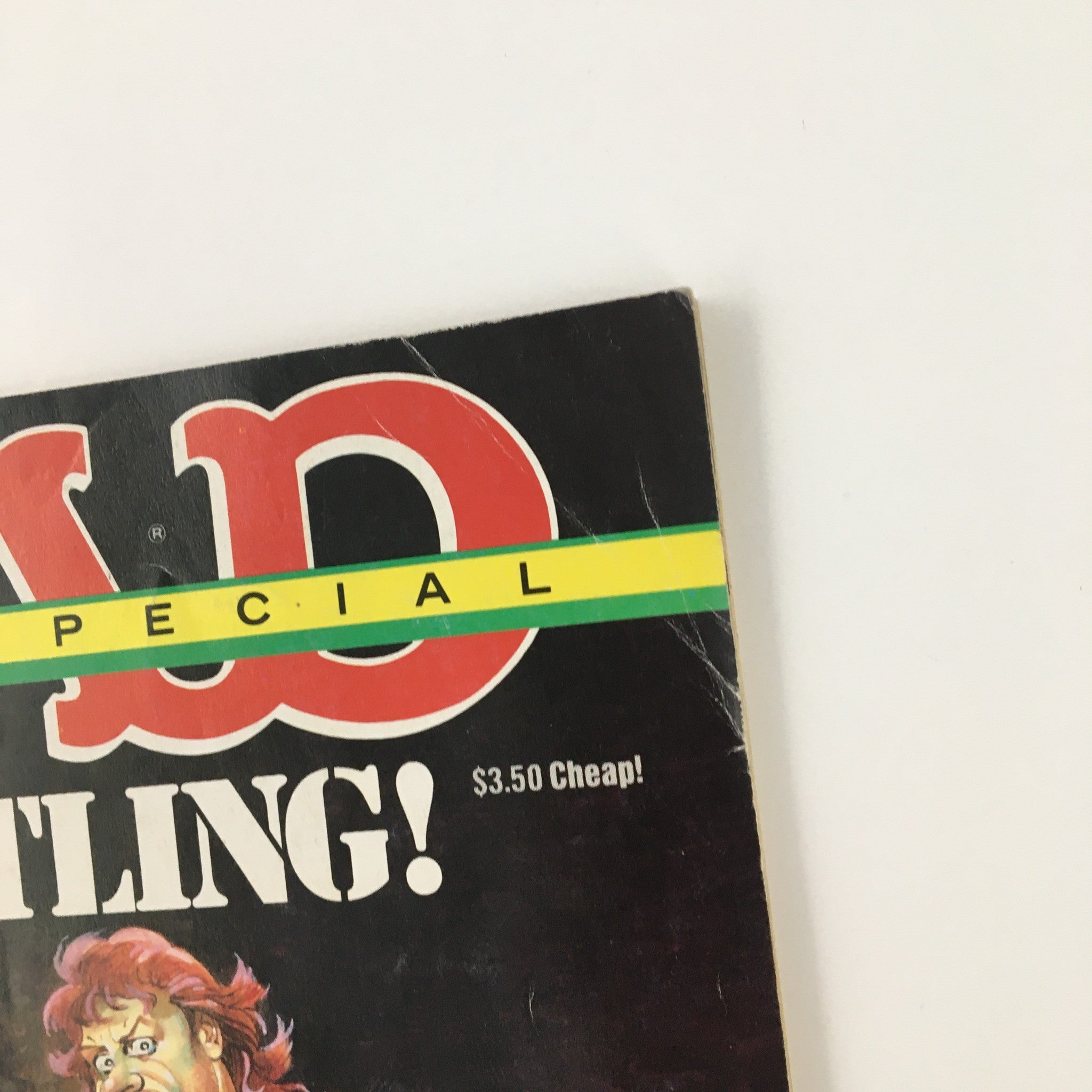 Close-up of the top corner of Mad Magazine March 1992 No. 80 Super Special Wrestling, highlighting its logo and price tag.