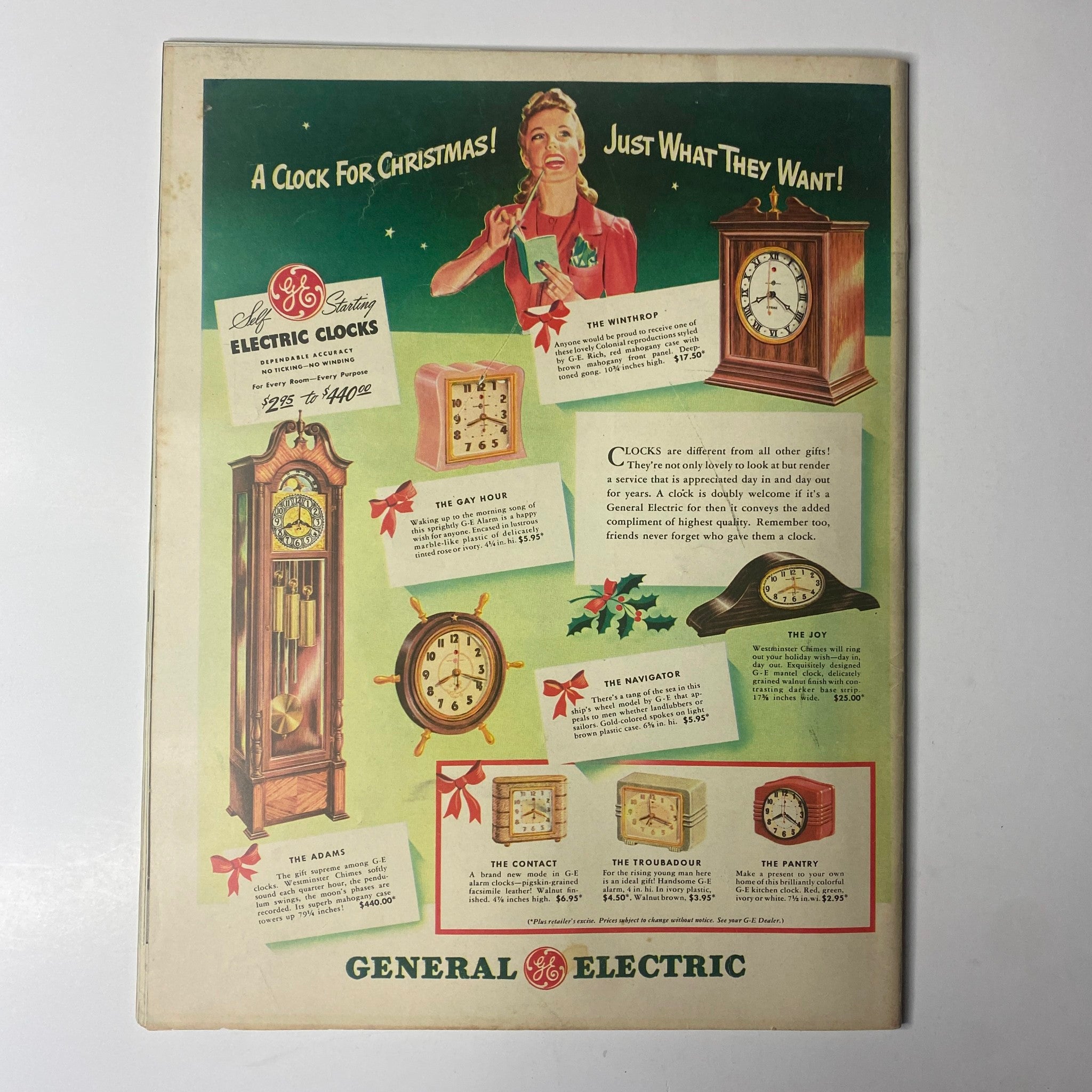Advertisement from Look Magazine December 16, 1941 for General Electric clocks, featuring stylish designs in a festive layout appealing to holiday shoppers.