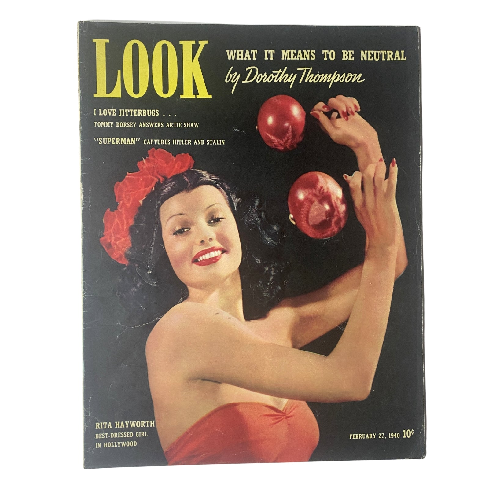 Look Magazine cover from February 27, 1940 featuring Rita Hayworth, capturing her before Hollywood stardom, with red apples and the text 'LOOK WHAT IT MEANS TO BE NEUTRAL'.