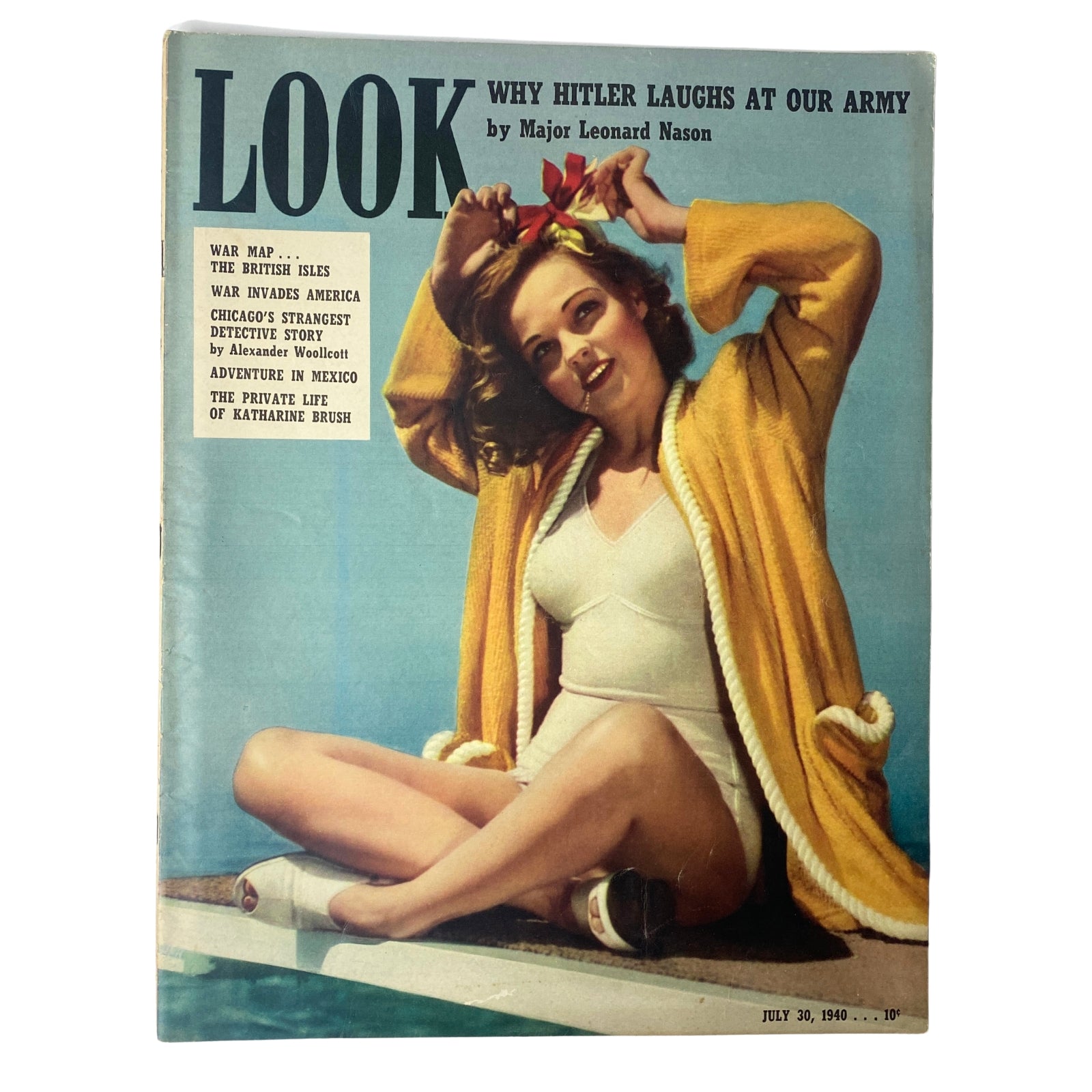 Cover of Look Magazine dated July 30, 1940, featuring the headline 'Why Hitler Laughs at Our Army' by Major Leonard Nason, showcasing a glamorous actress resembling Paulette Goddard.