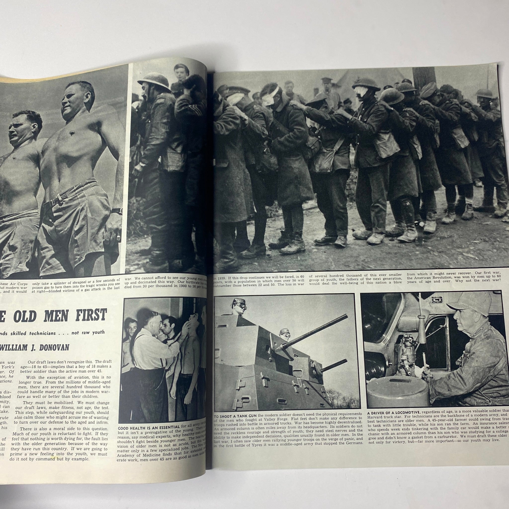 Article spread from Look Magazine July 30, 1940, highlighting 'Draft the Old Men First' by Col. William J. Donovan, with images depicting military mobilization.