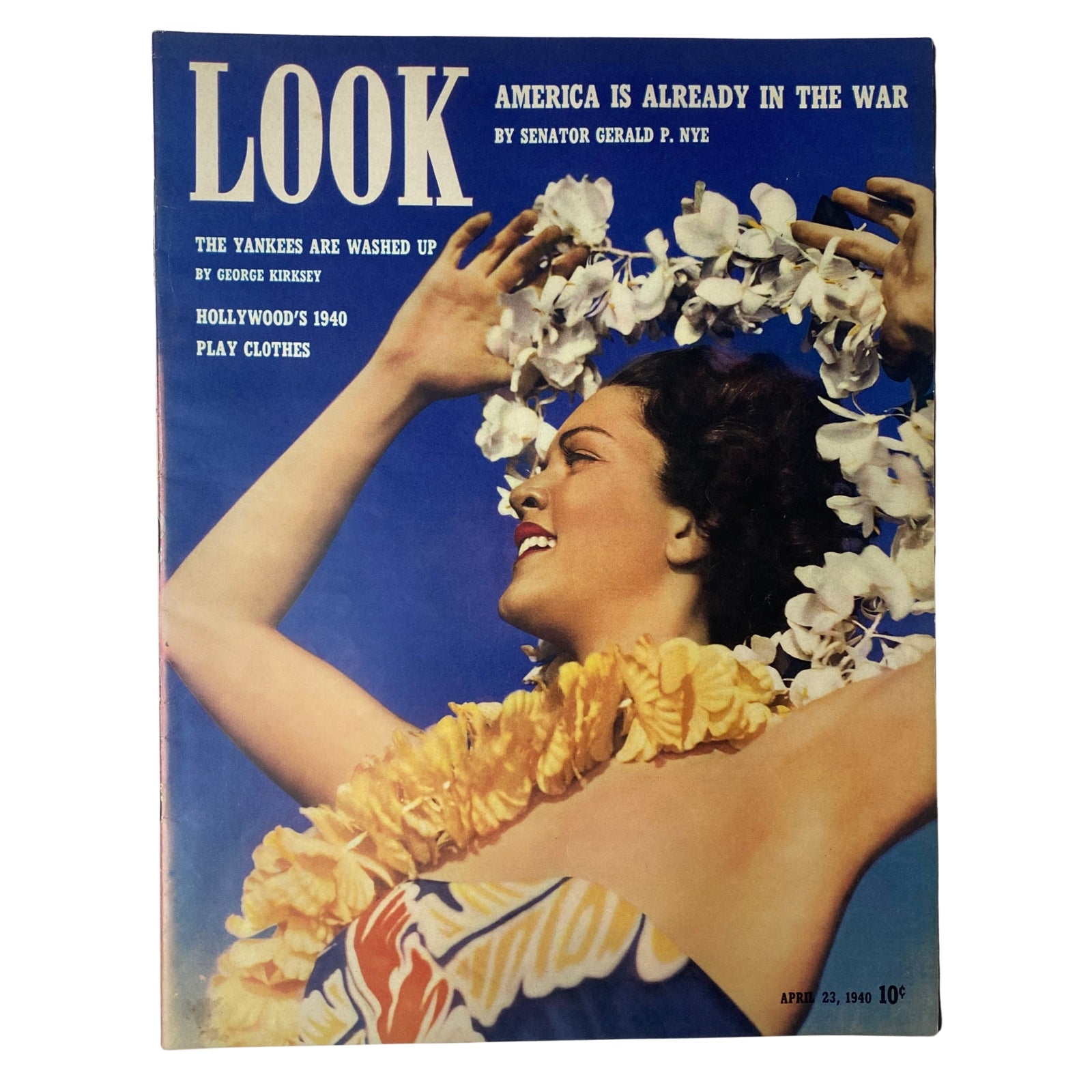 Cover of Look Magazine dated April 23, 1940, featuring the headline 'America is Already in the War' by Senator Gerald P. Nye, showcasing a woman in a floral headdress.