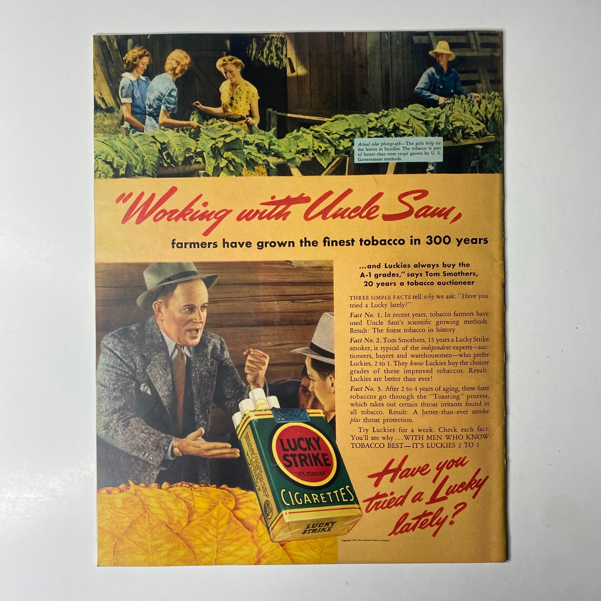Cover of Look Magazine, April 23, 1940, featuring the headline 'Working with Uncle Sam' alongside a vintage advertisement for Lucky Strike cigarettes, highlighting tobacco farming.