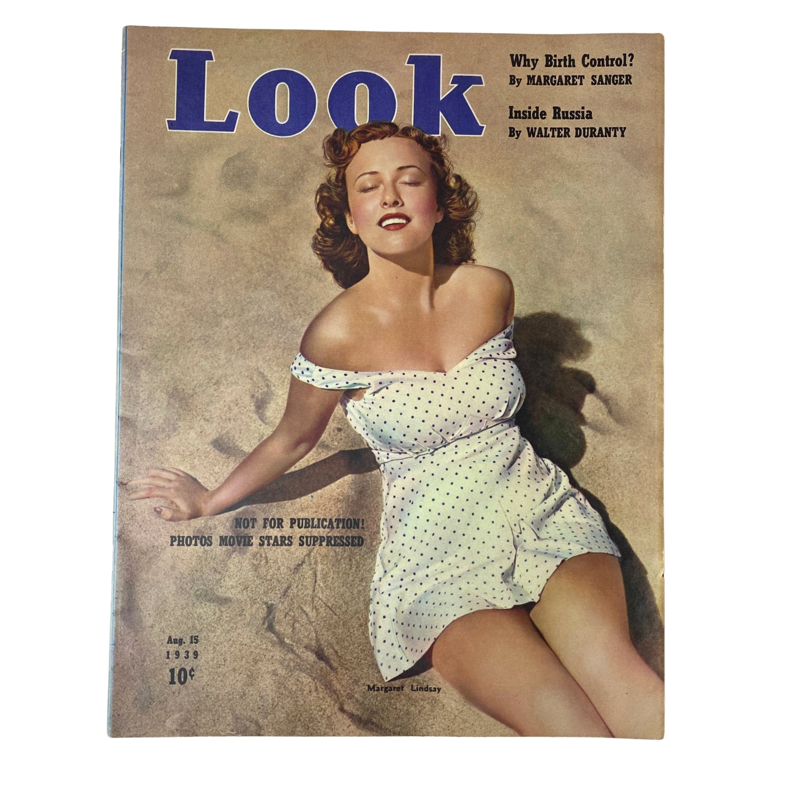 Look Magazine August 15, 1939 featuring a cover image of actress Margaret Lindsay in a polka-dot dress lying on the beach, showcasing fashion and film history.