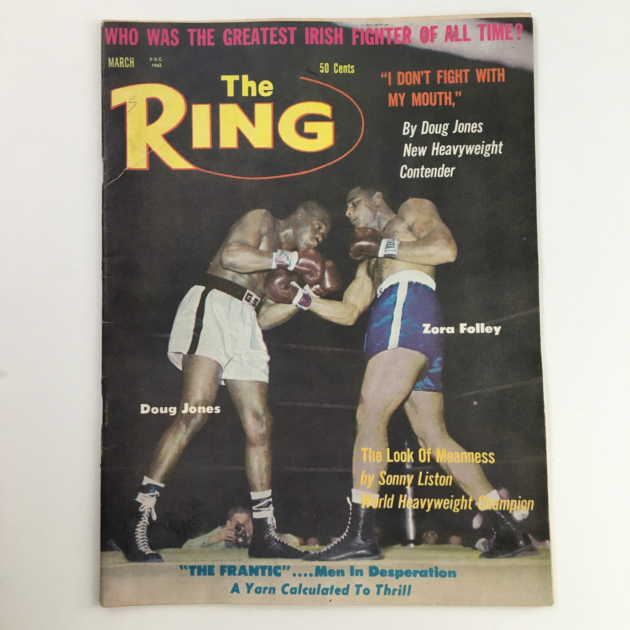 The Ring Boxing Magazine March 1963 featuring Doug Jones vs Zora Folley on the cover, showcasing an intense boxing match with both fighters in action.
