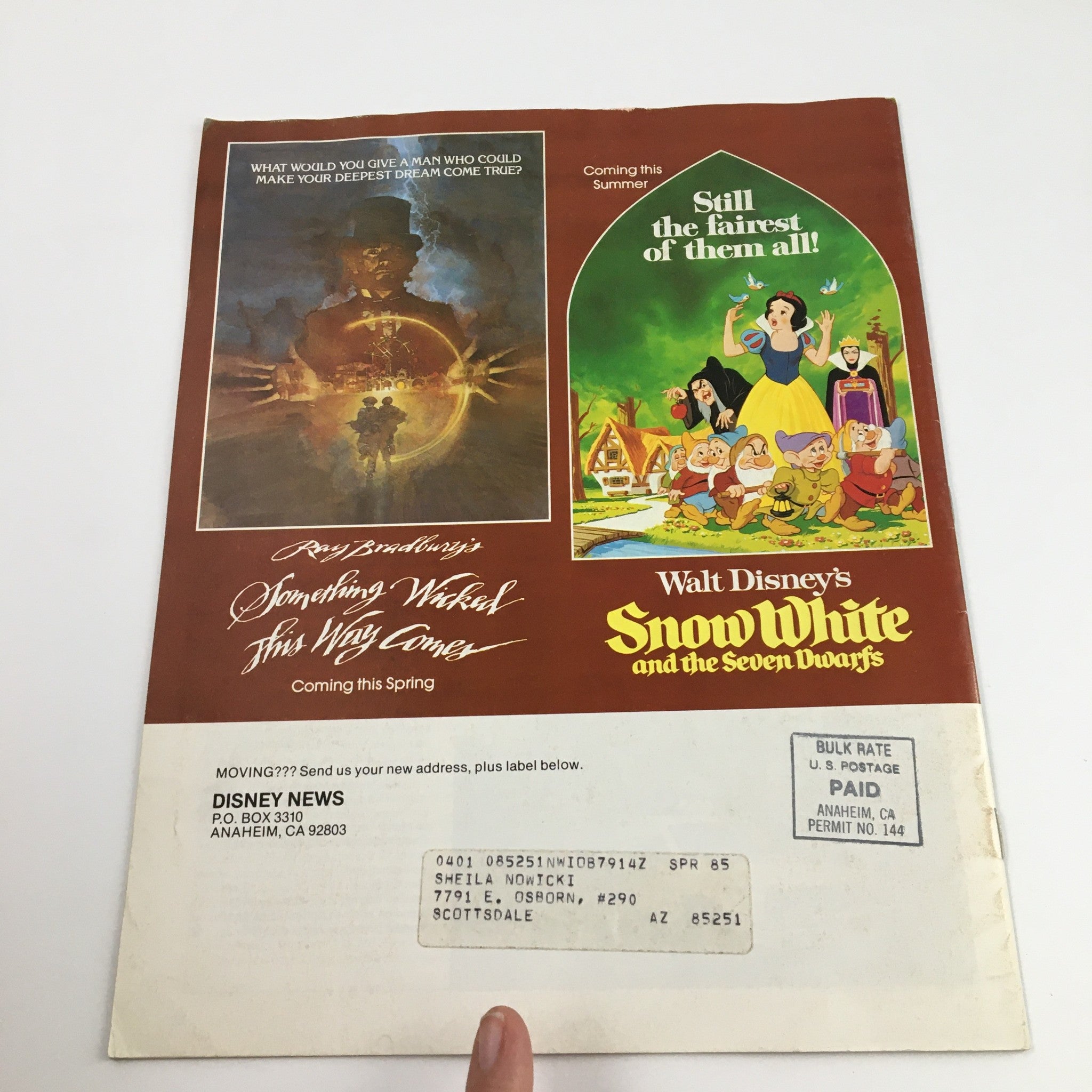 Back cover of Disney News Magazine Spring 1984 showcasing promotional art for Disney's upcoming films, including 'Something Wicked This Way Comes' and 'Snow White and the Seven Dwarfs', along with a subscriber address label.