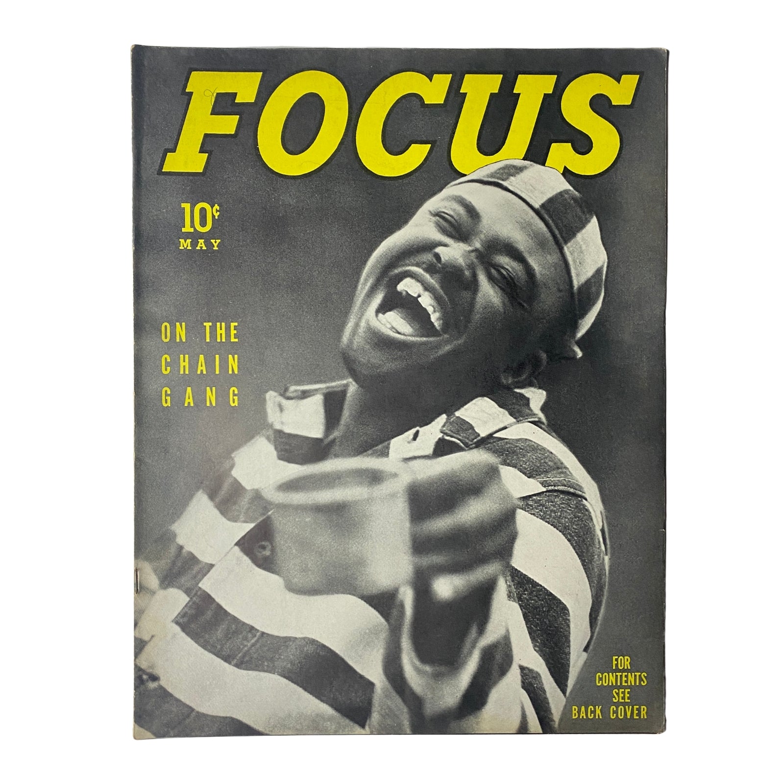 Cover of Focus Magazine, May 1938, featuring the title 'Focus' prominently displayed above an image of a man in striped prison attire, laughing and holding a metal cup, with a feature article about 'The Chain Gang System.'