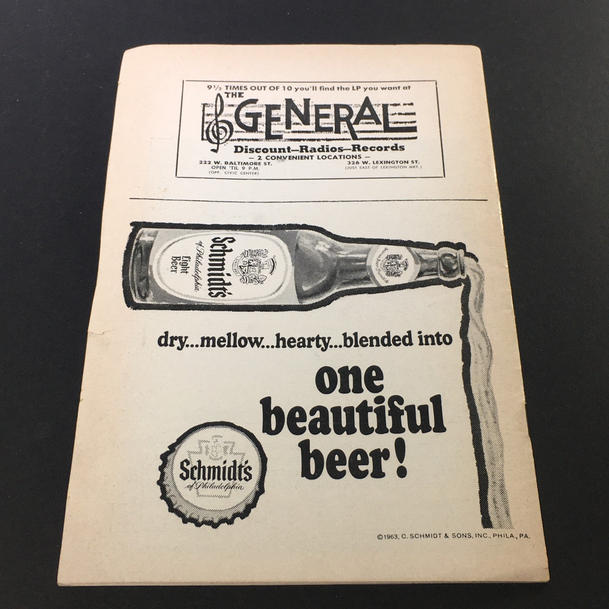Advertisement for Schmidt's beer found in the vintage program from the Painters Mill Music Fair, showcasing historical branding from the event dated July 14, 1966.