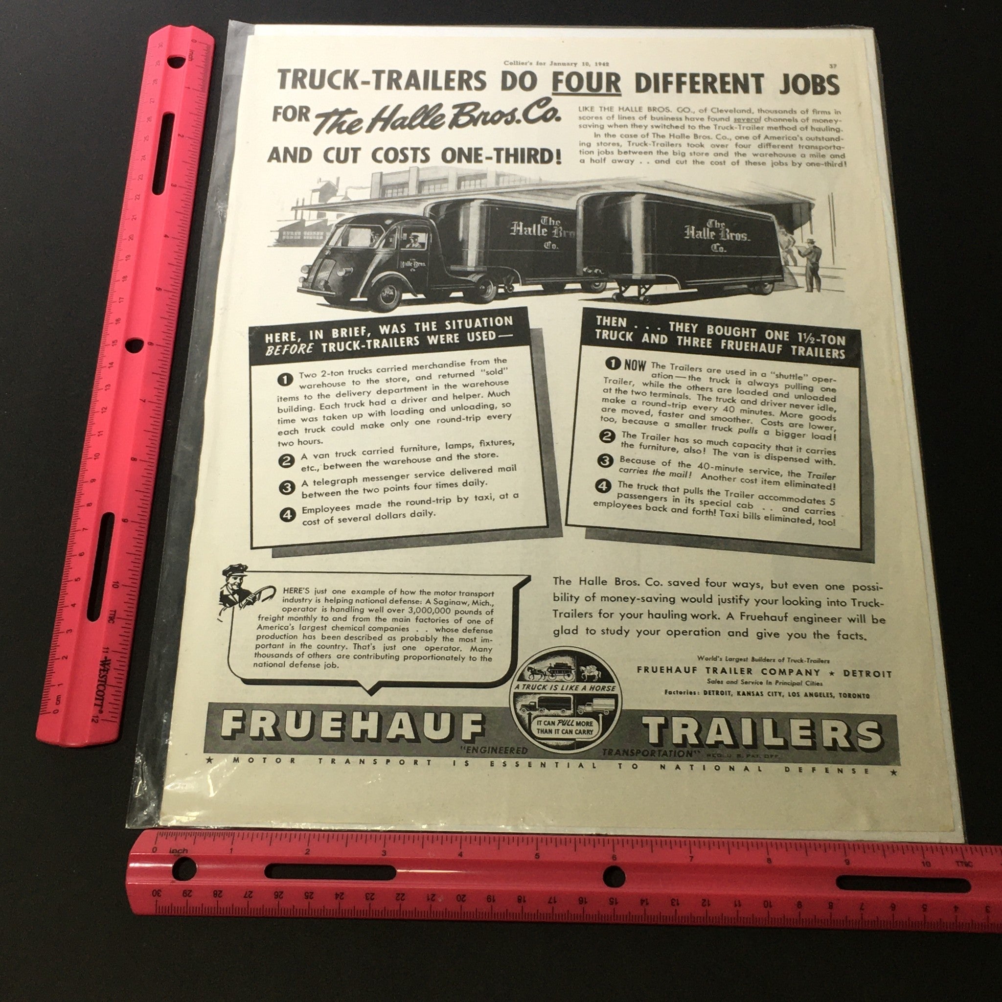 Detailed view of the Vintage Fruehauf Trailers Print Ad January 10 1942 with measurements visible, emphasizing The Halle Bro's Co. Truck.