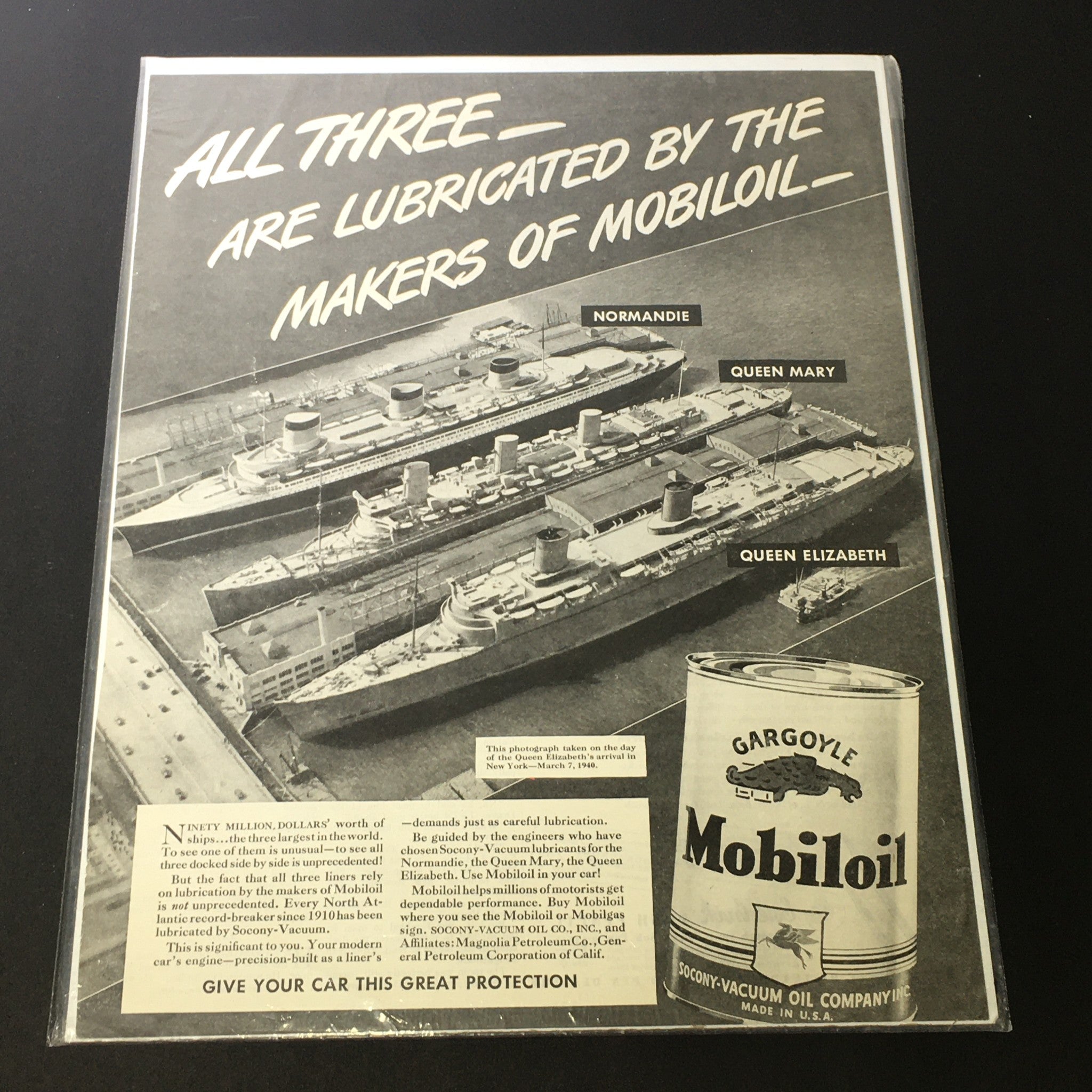 VTG 1940 Gargoyle Mobiloil Print Ad featuring ships Normandie, Queen Mary, and Queen Elizabeth, highlighting the lubrication provided by Mobiloil.