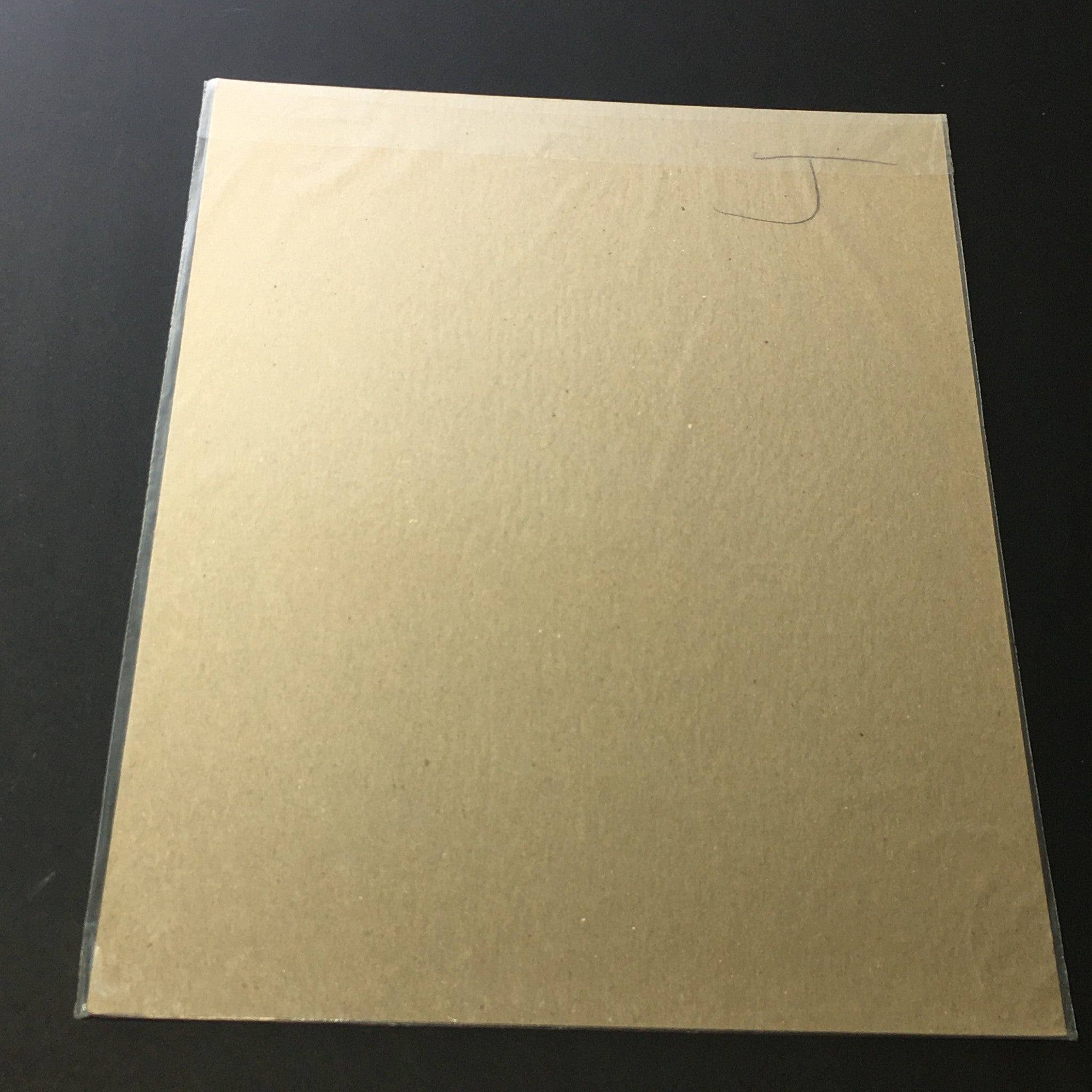 Reverse side of VTG 1940 The American Tobacco-Company Lucky Strike Cigarettes Print Ad, showing a blank surface protected by a plastic covering.