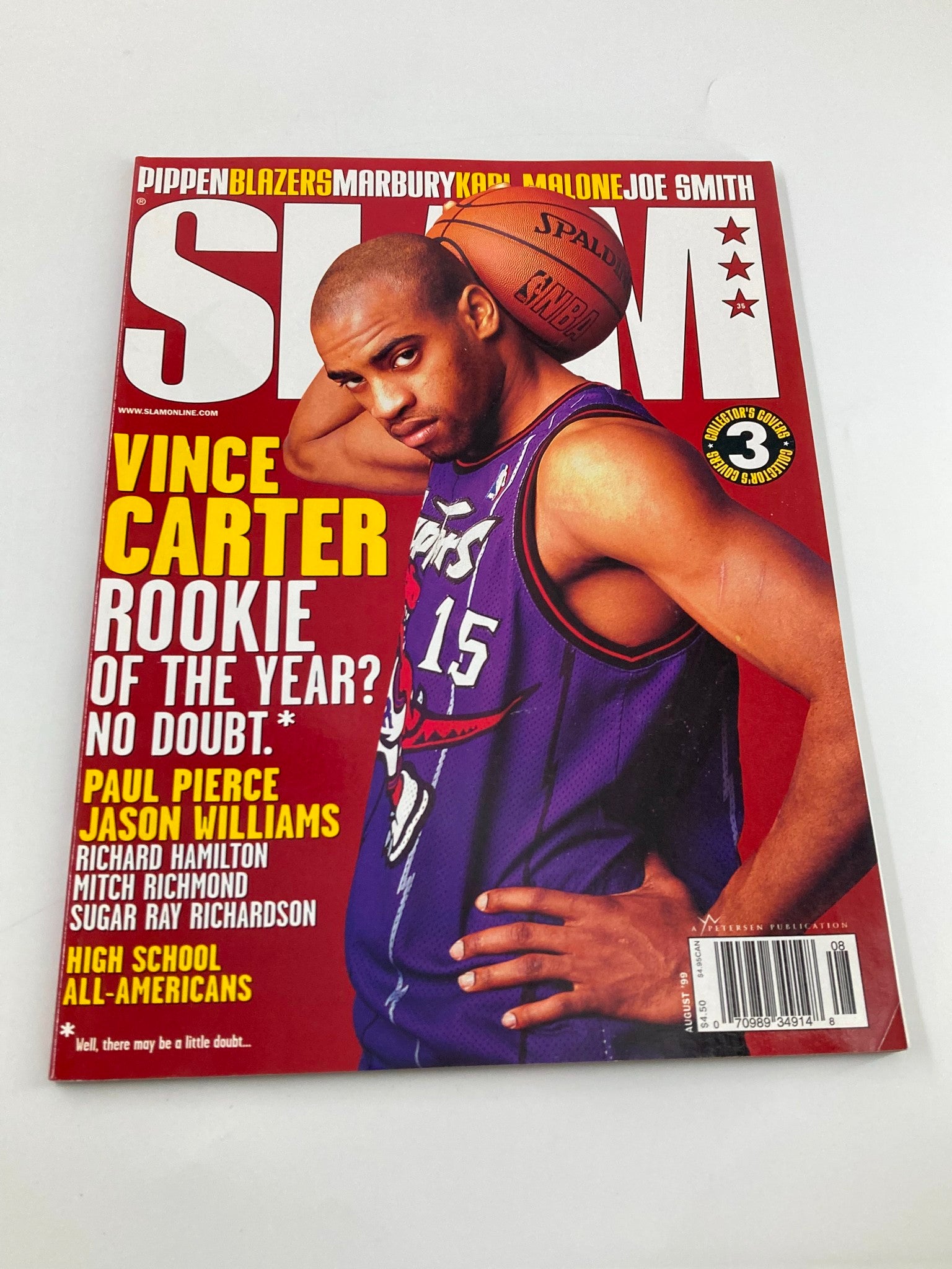 Cover of Slam Magazine August 1999 featuring Vince Carter, rookie of the year candidate from the Toronto Raptors, showcasing his dynamic basketball pose and highlighting his influence during his rookie season.