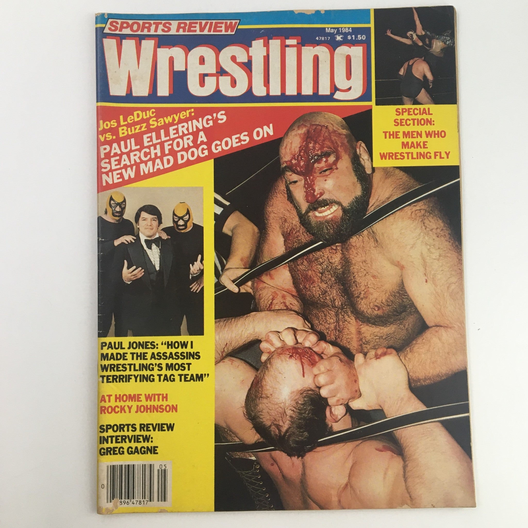Sports Review Wrestling Magazine May 1984 featuring Jos LeDuc vs Buzz Sawyer with a dramatic cover image depicting intense wrestling action and promotional highlights.