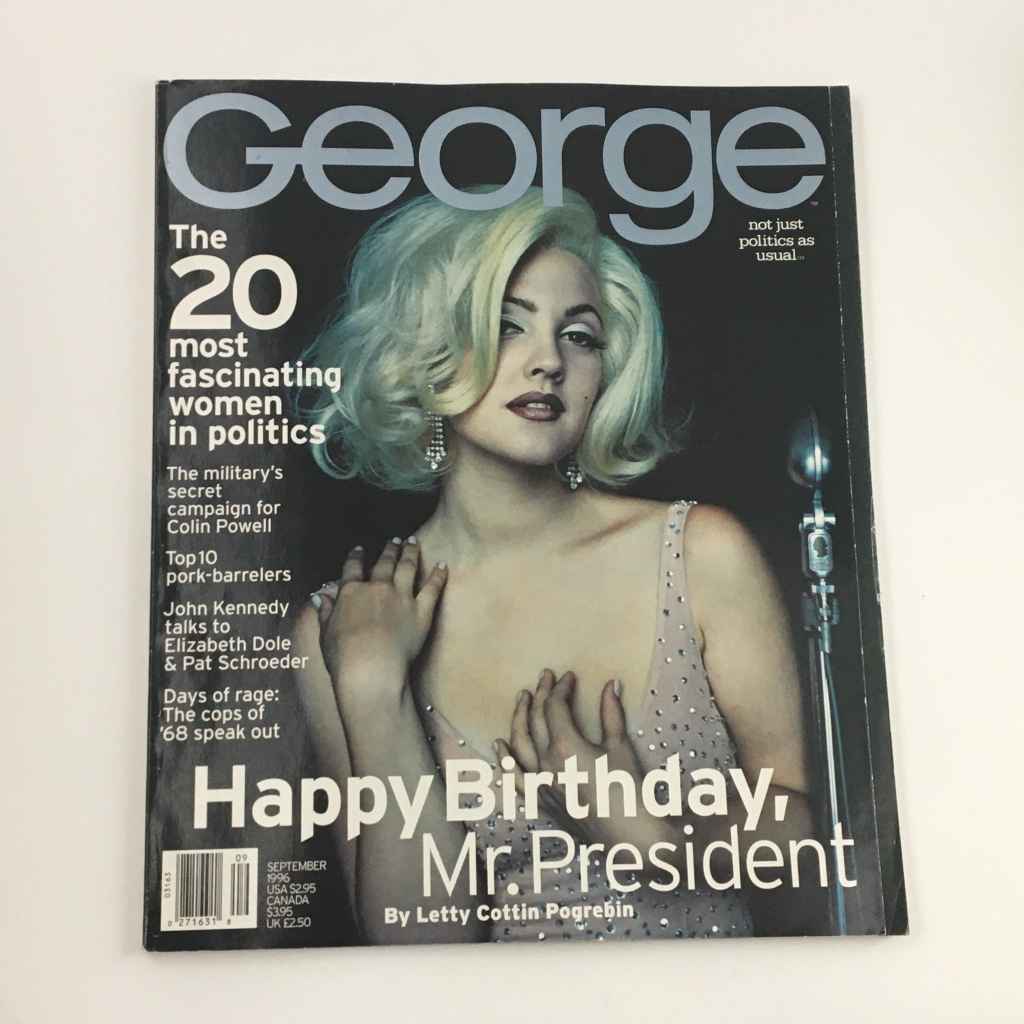 Cover of George Magazine, September 1996, featuring Drew Barrymore and Colin Powell with a campaign theme