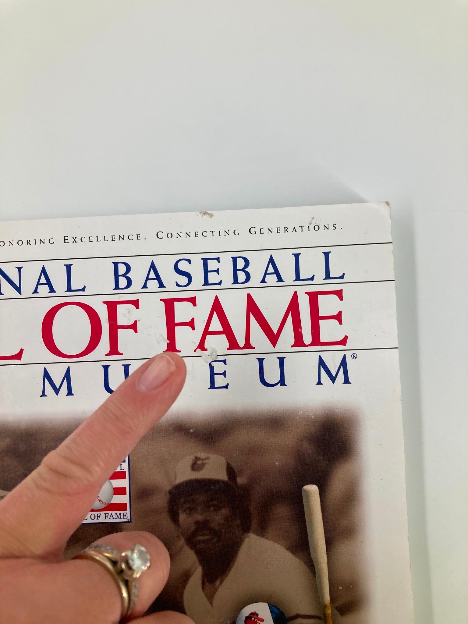 Close-up of the 2003 National Baseball Hall of Fame and Museum Yearbook cover, showing the title prominently with a finger pointing at 'Hall of Fame', symbolizing the importance of this vintage magazine.