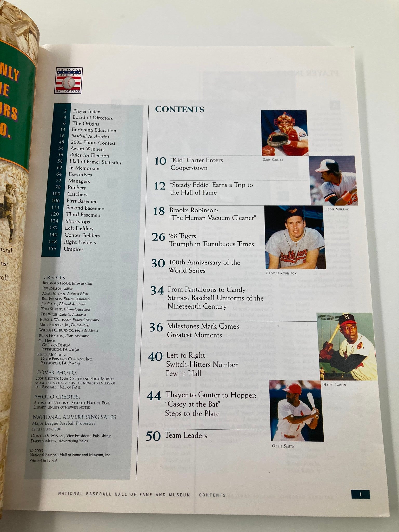 Contents page from the 2003 National Baseball Hall of Fame and Museum Yearbook featuring sections on Hall of Famers like Kid Carter, Brooks Robinson, and Eddie Murray, along with team leaders and notable milestones in baseball history.