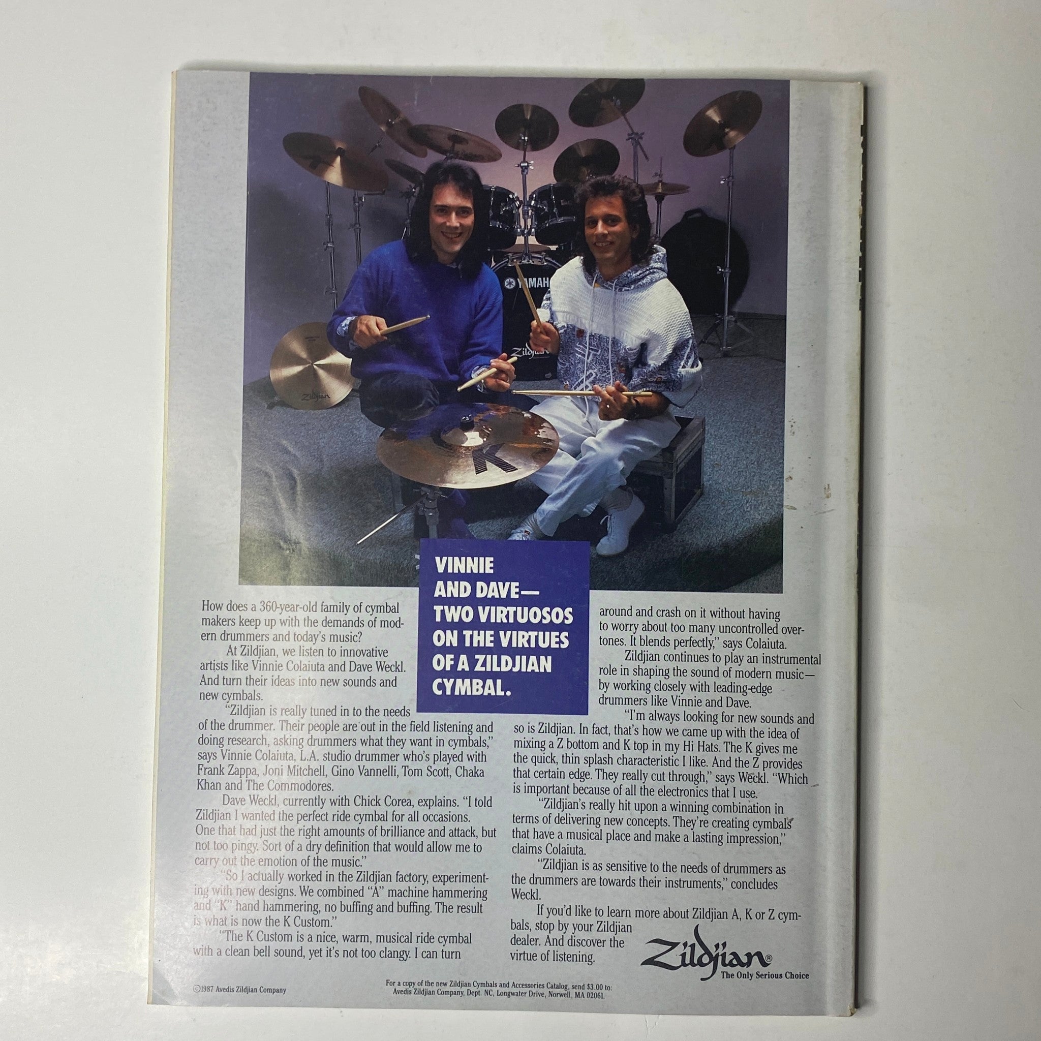 Back cover of Modern Drummer Magazine February 1989 featuring a discussion between drummers Vinnie and Dave on the virtues of Zildjian cymbals.