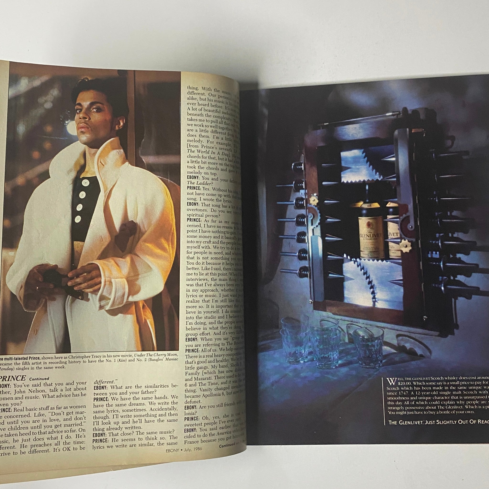 An article page from Ebony Magazine July 1986 showcasing a photoshoot of Prince, emphasizing his unique style and charm. The issue features insights into his music and personal life.