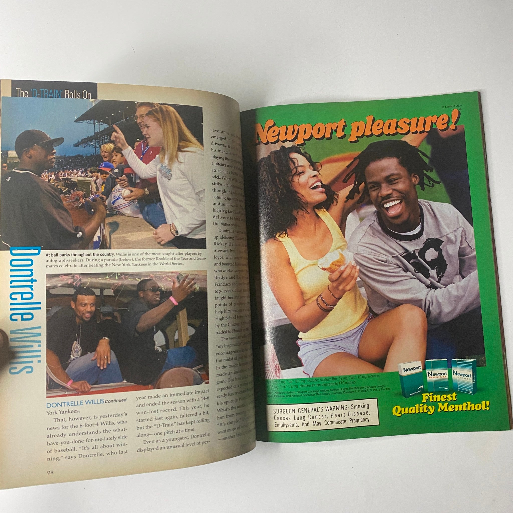 Ebony Magazine August 2004 open spread featuring an article on Dontrelle Willis alongside an advertisement for Newport cigarettes, showcasing relevant cultural content and brand promotion.