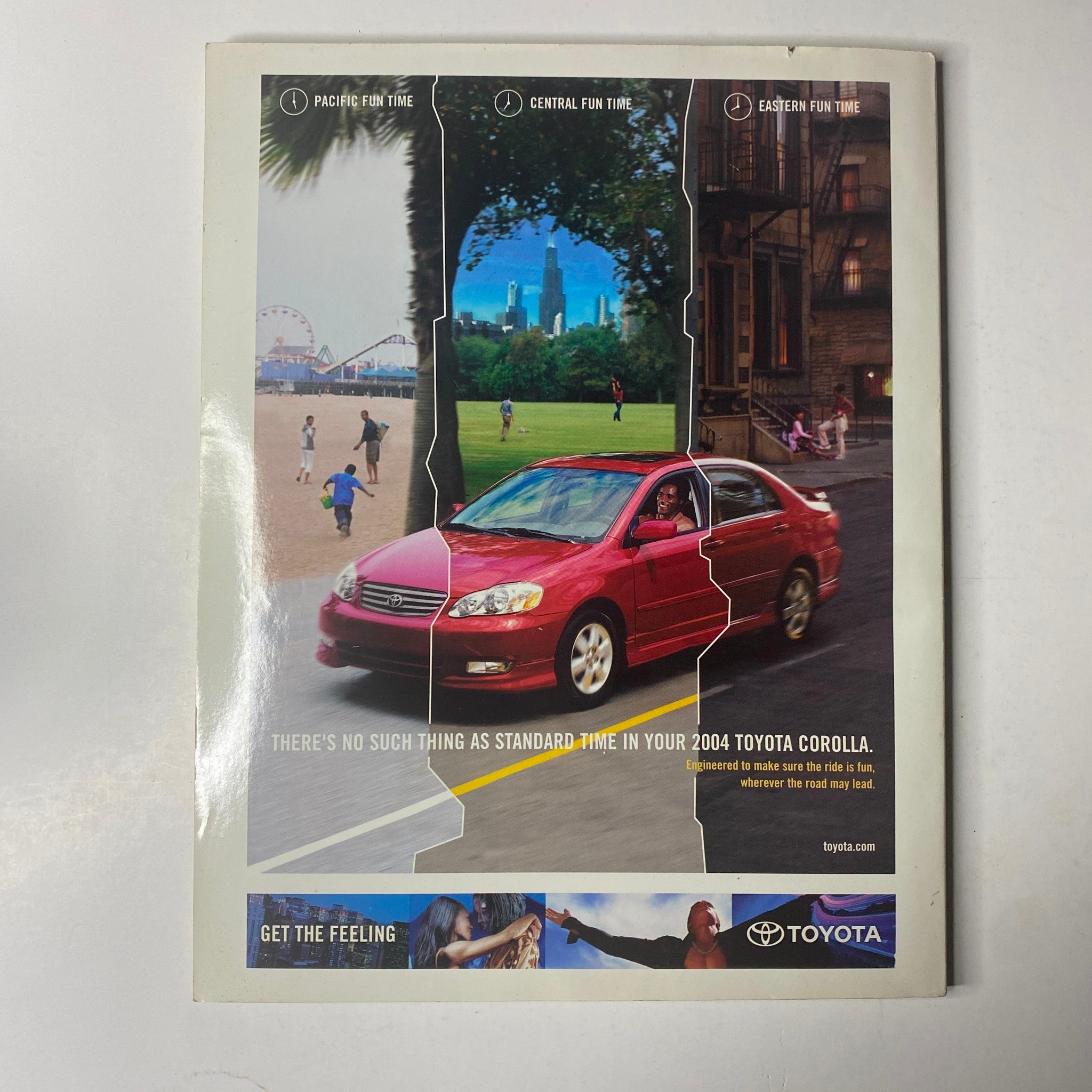 Ad for the 2004 Toyota Corolla featuring a split design illustrating different fun activities across different time zones, with an image of the car in motion. Related to the Ebony Magazine December 2003 issue featuring Damon Wayans and Tisha Campbell on the cover.