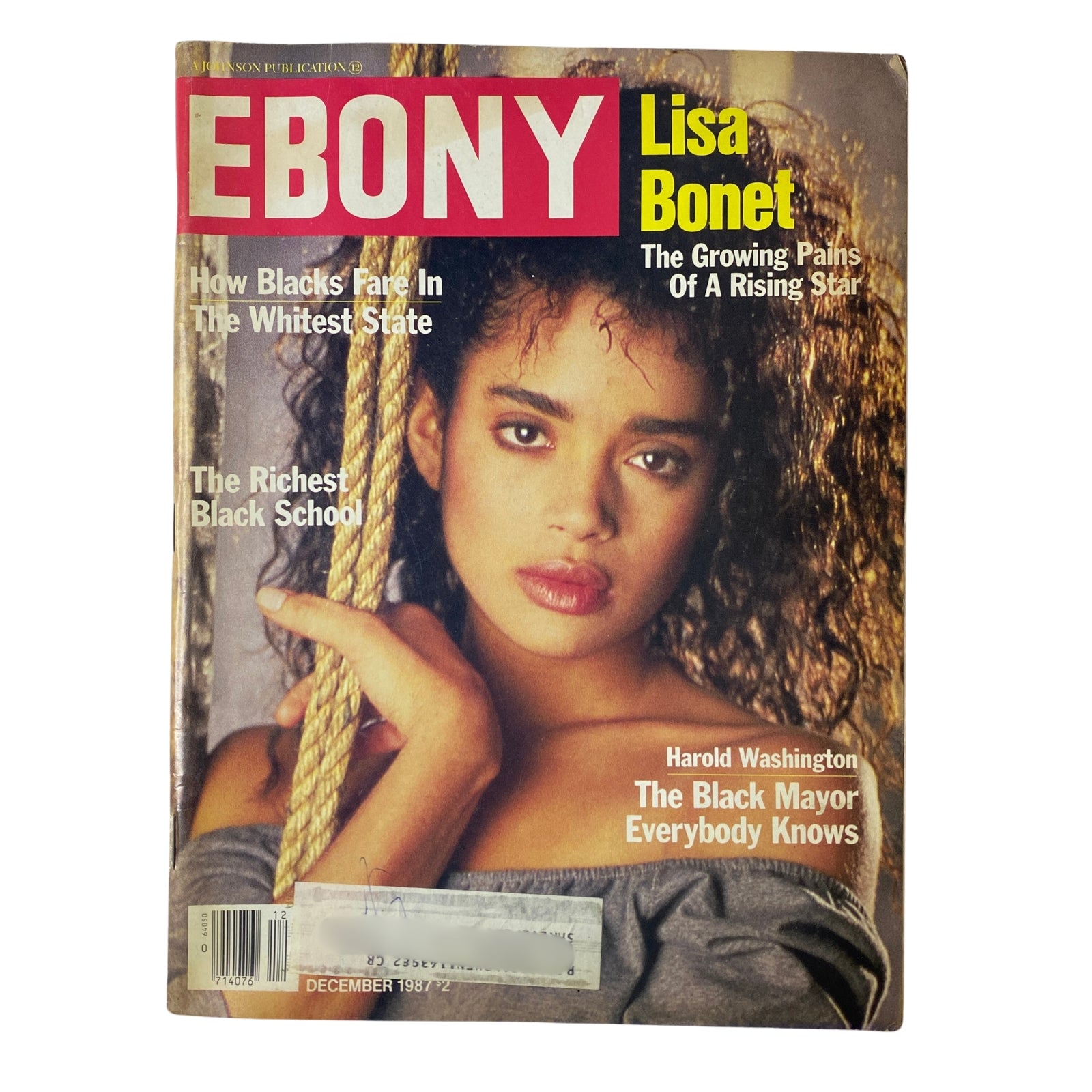 Ebony Magazine December 1987 featuring Lisa Bonet on the cover, showcasing the title 'The Growing Pains of a Rising Star.' Includes headlines discussing race relations, education, and politics.