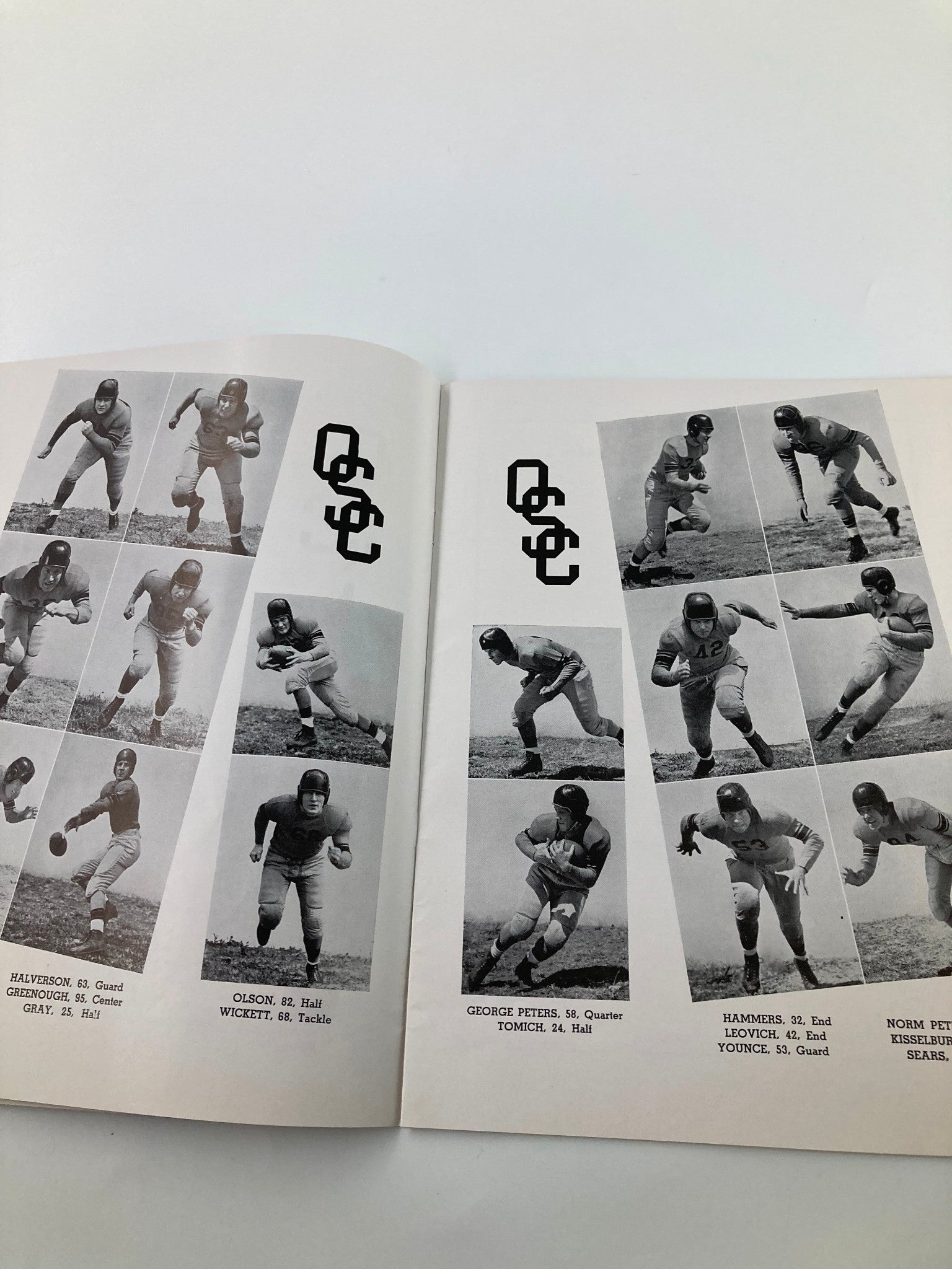 Pages from 'The Pigskin Review' showcasing player portraits from the USC Trojans football team, highlighting athlete positions and statistics.