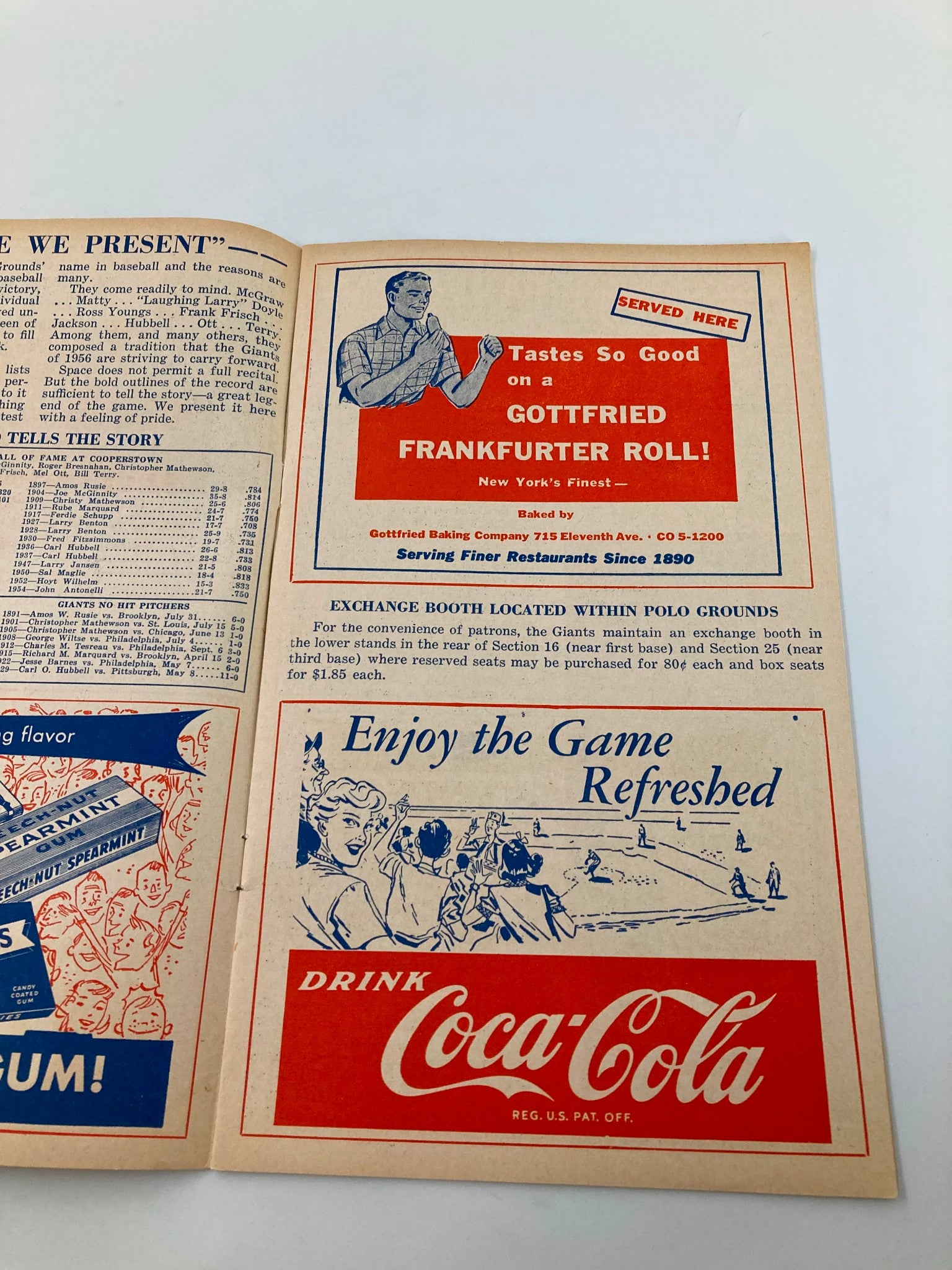 Inside view of the 1956 MLB New York Giants Official Program and Score Card showing advertisements for Gottfried Frankfurter Roll and Coca-Cola, highlighting the food and refreshments available at Polo Grounds.