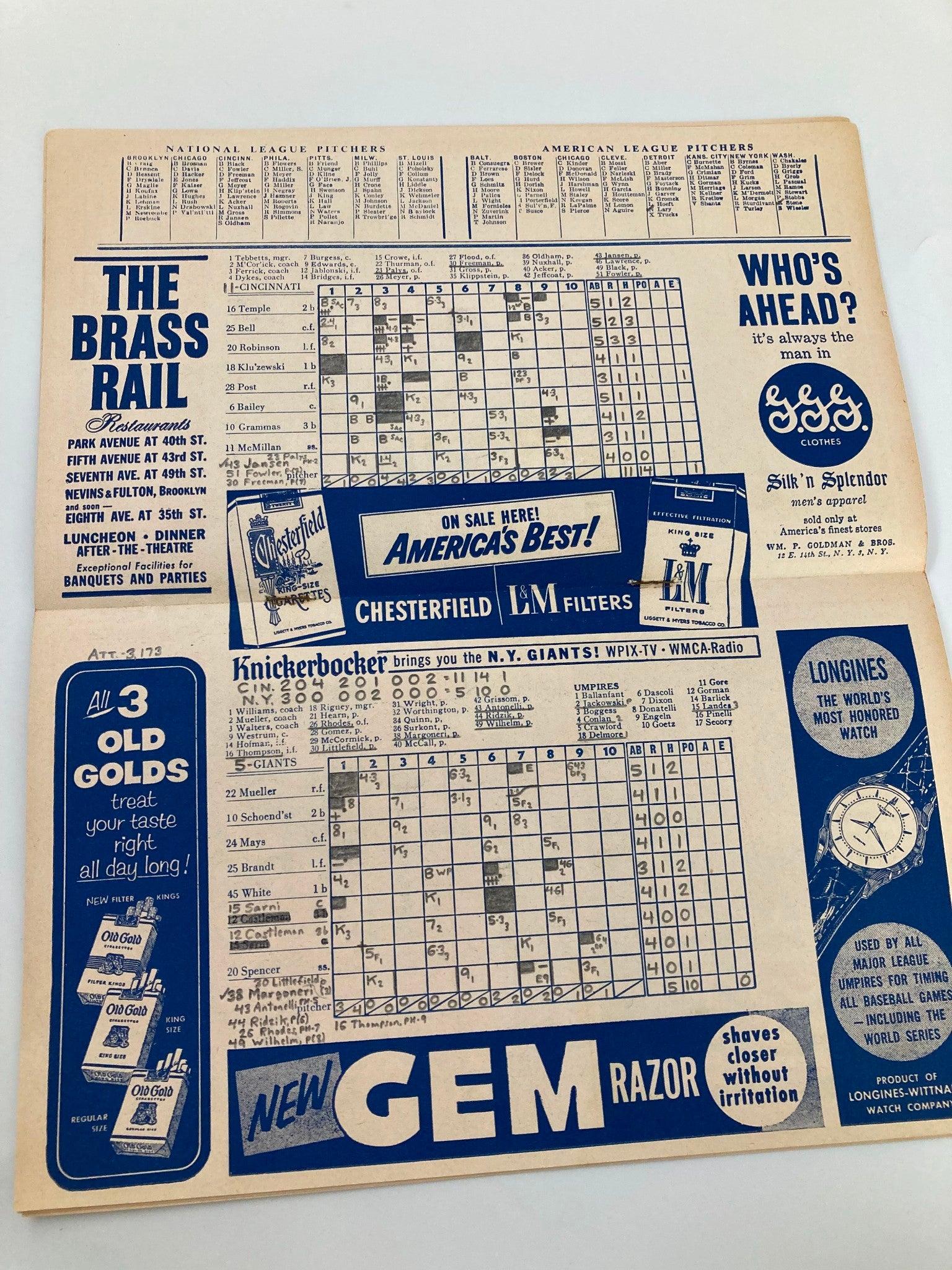Scoreboard layout from the 1956 MLB New York Giants Official Program and Score Card displaying player statistics and game scores, emphasizing its collectible nature with handwritten details.