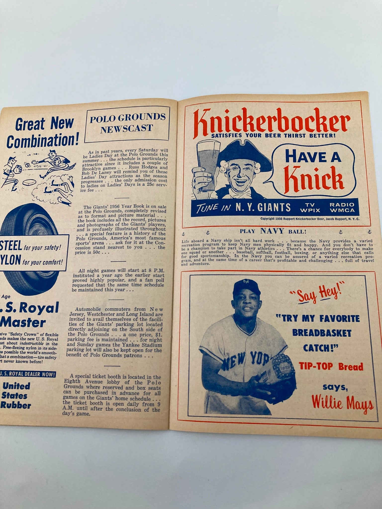 1956 MLB New York Giants Official Program and Score Card highlighting Polo Grounds Newscast and an advertisement featuring Willie Mays, representing iconic moments from Major League Baseball.
