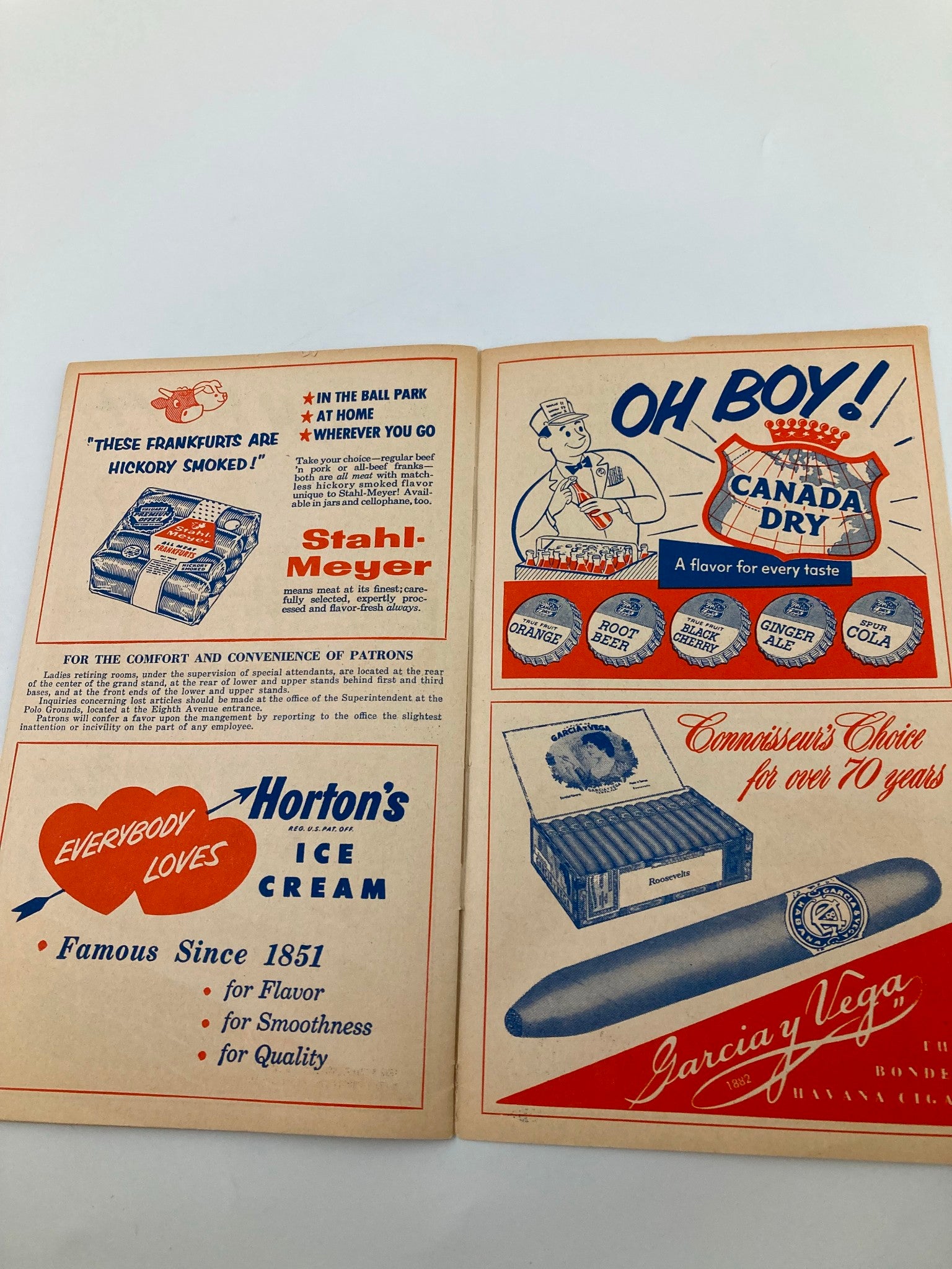 1956 MLB New York Giants Official Program and Score Card featuring advertisements for Stahl-Meyer franks, Canada Dry beverages, and Horton’s ice cream, illustrating the cultural elements of baseball fandom in the 1950s.
