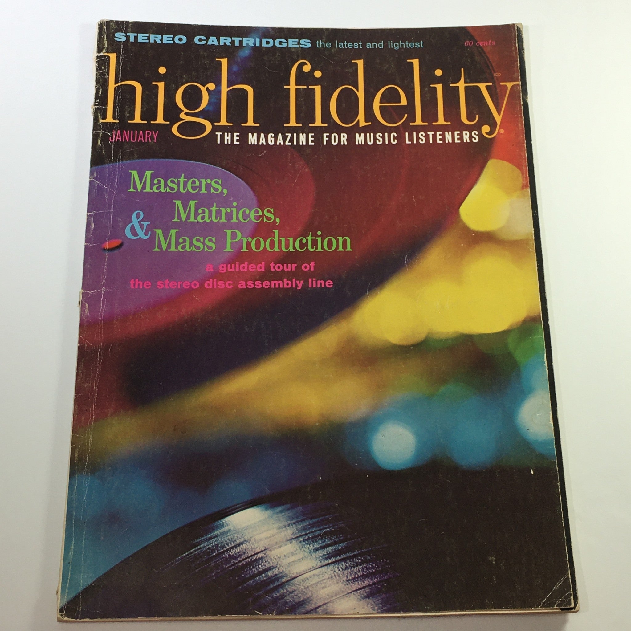 Cover of the VTG High Fidelity Music Magazine January 1965 featuring the title and a vibrant graphic design with text 'Masters, Matrices, & Mass Production' related to stereo disc assembly.
