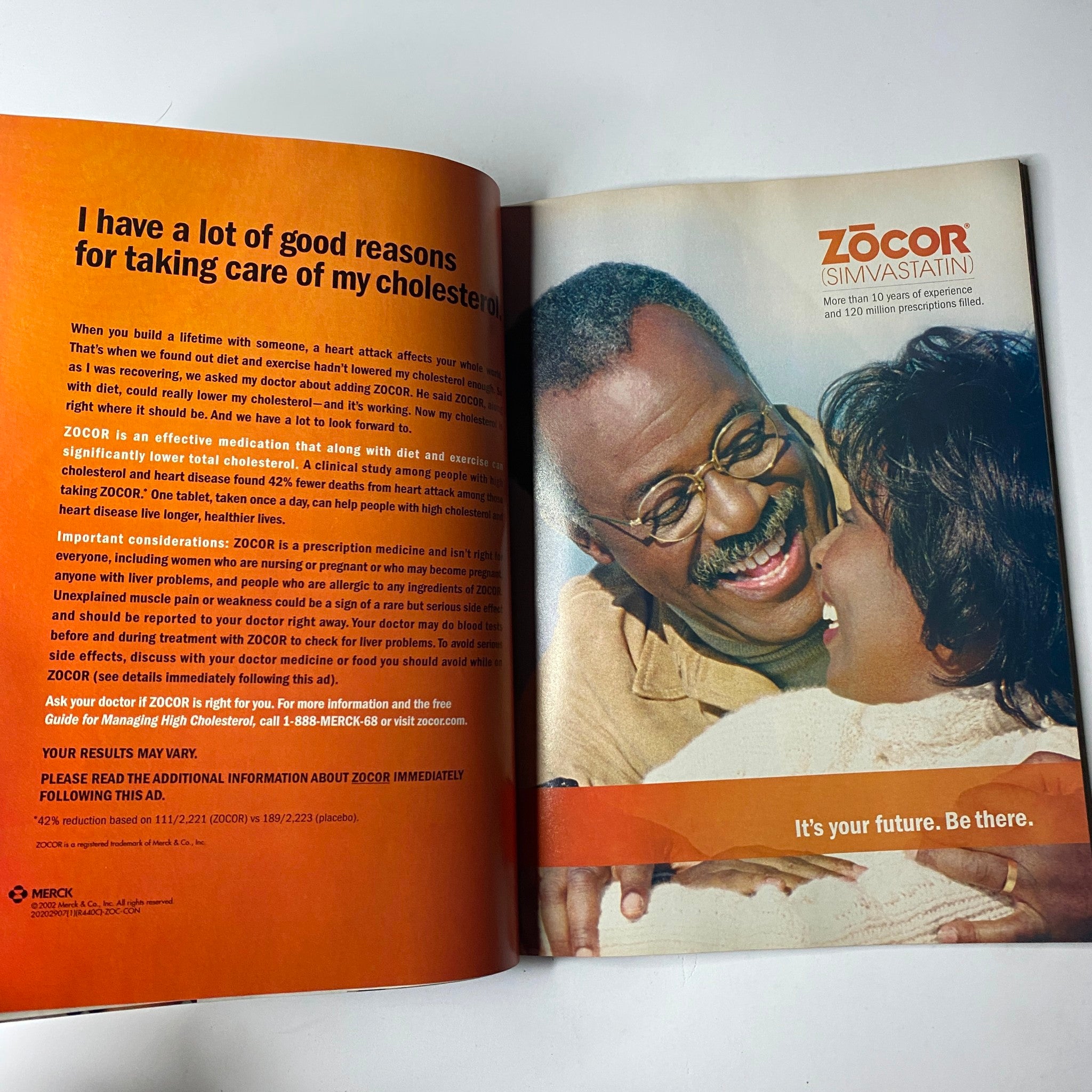 Advertisement for Zocor medication featured in Ebony Magazine August 2002 Vol. LVII, No. 10, promoting cholesterol management with a focus on a happy couple.