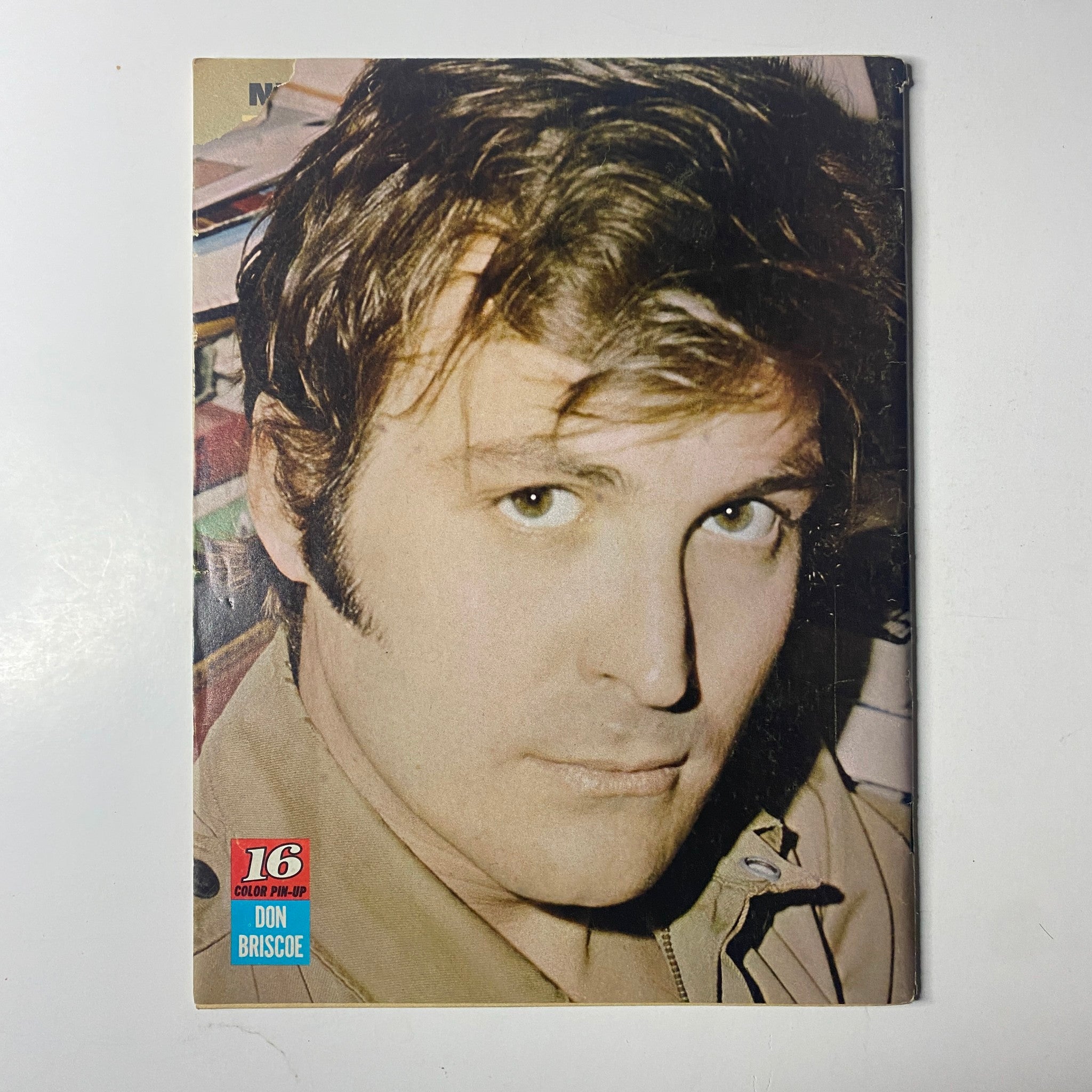 Cover of 16 Magazine November 1969 featuring Mike Cole and Barry Cowsill, showcasing a portrait of Don Briscoe. This magazine includes exclusive pin-ups and a bonus poster.
