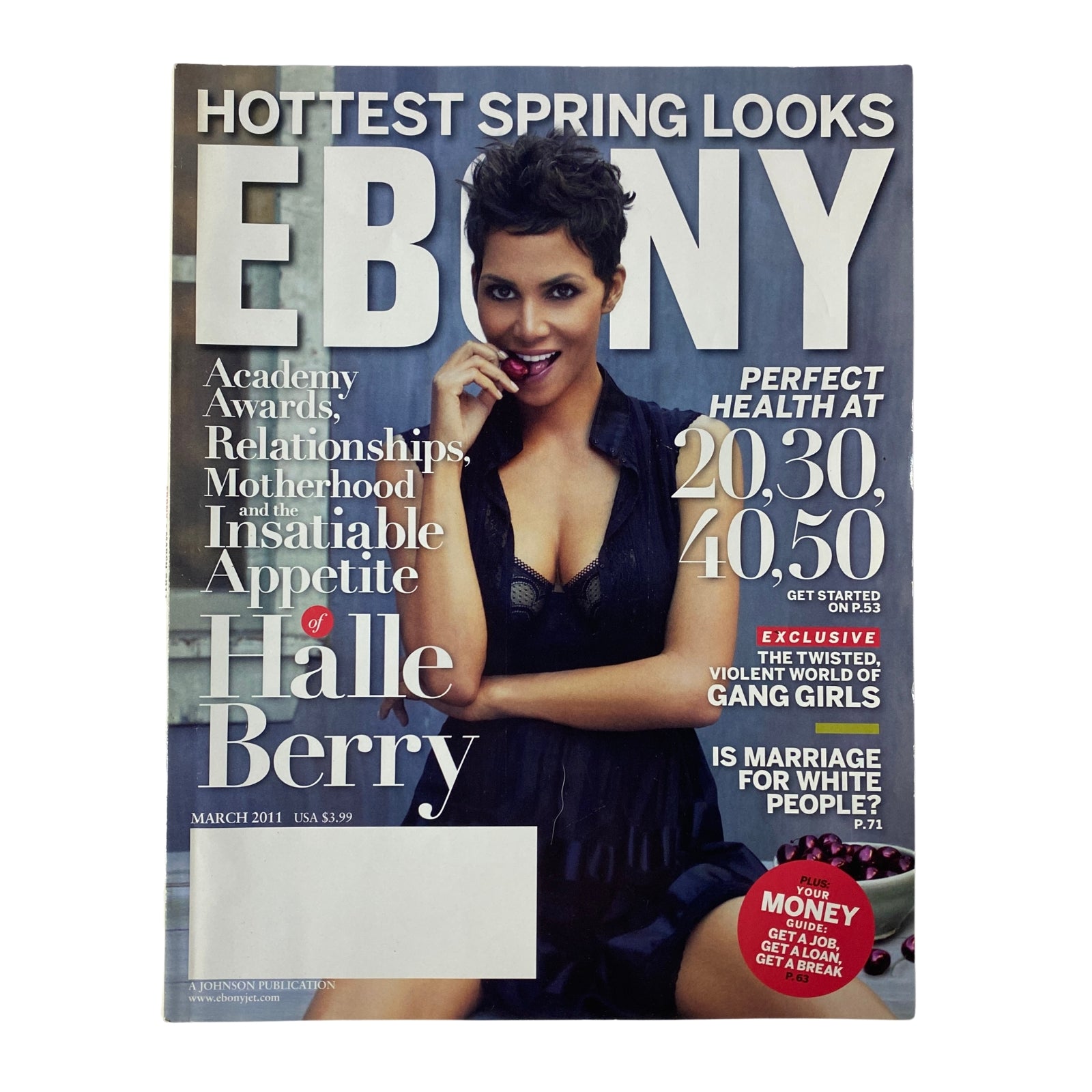 Ebony Magazine March 2011, Vol. LXVI, No. 5 featuring Halle Berry on the cover in a black dress, highlighting topics like health, relationships, and motherhood.