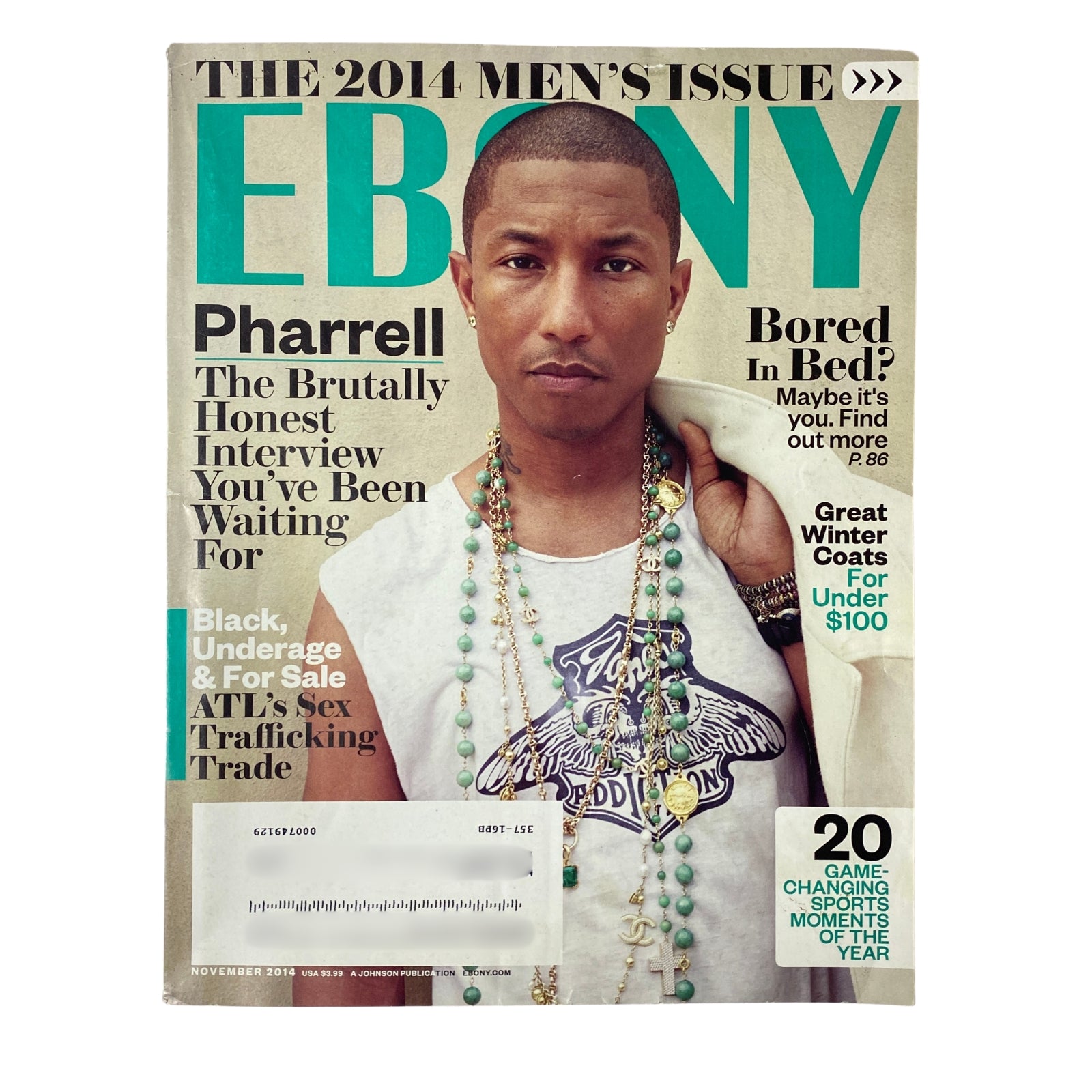 Ebony Magazine November 2014 Vol. LXX, No. 1 featuring Pharrell Williams on the cover, showcasing Black culture, music, and fashion.
