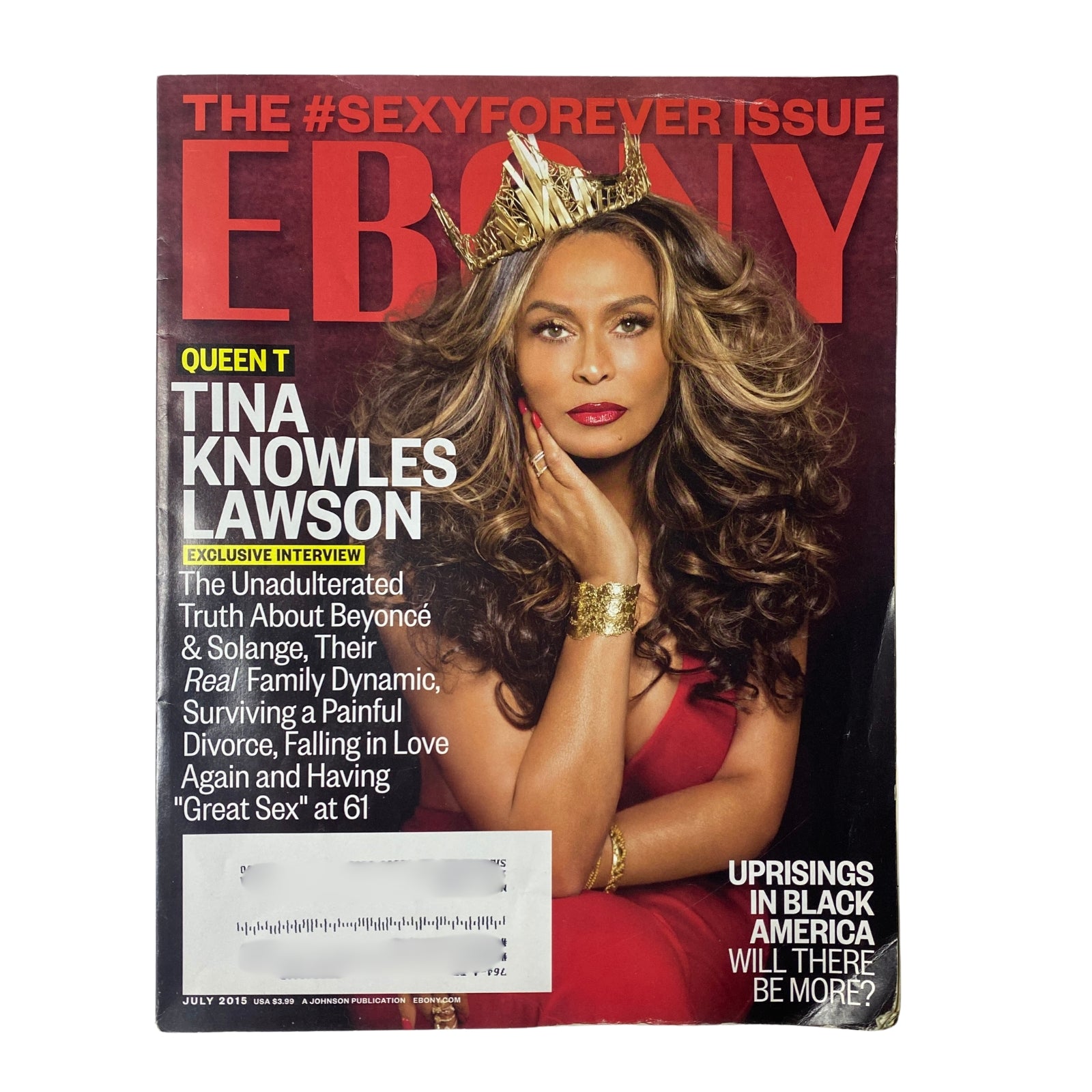 Ebony Magazine July 2015 Vol 70 No. 9 featuring Tina Knowles Lawson on the cover, showcasing her in a glamorous crown with flowing hair, symbolizing beauty and empowerment.