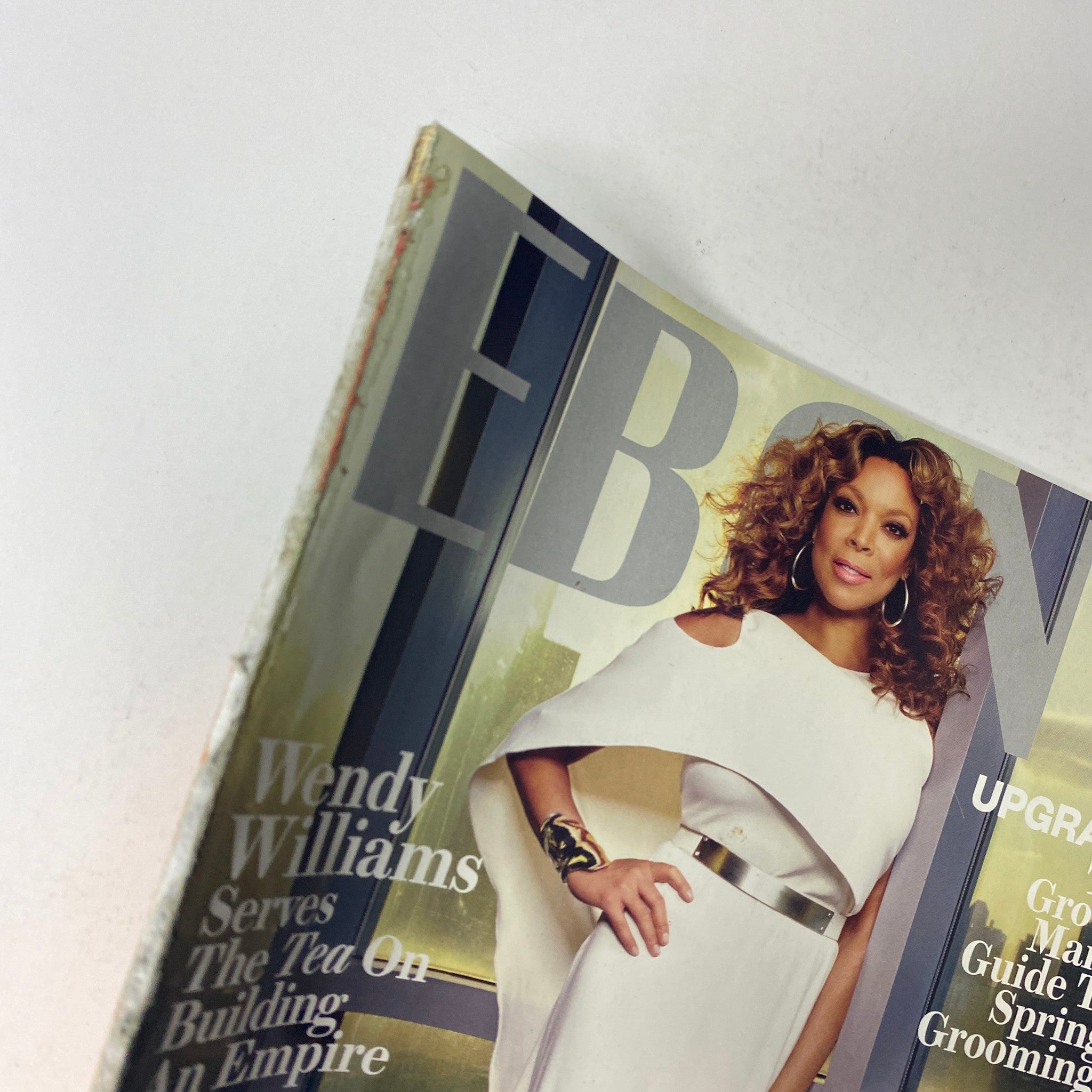 Close-up of Ebony Magazine May 2015 Vol 70 No. 7, highlighting Wendy Williams in a chic white dress, symbolizing her powerful presence in the media landscape.