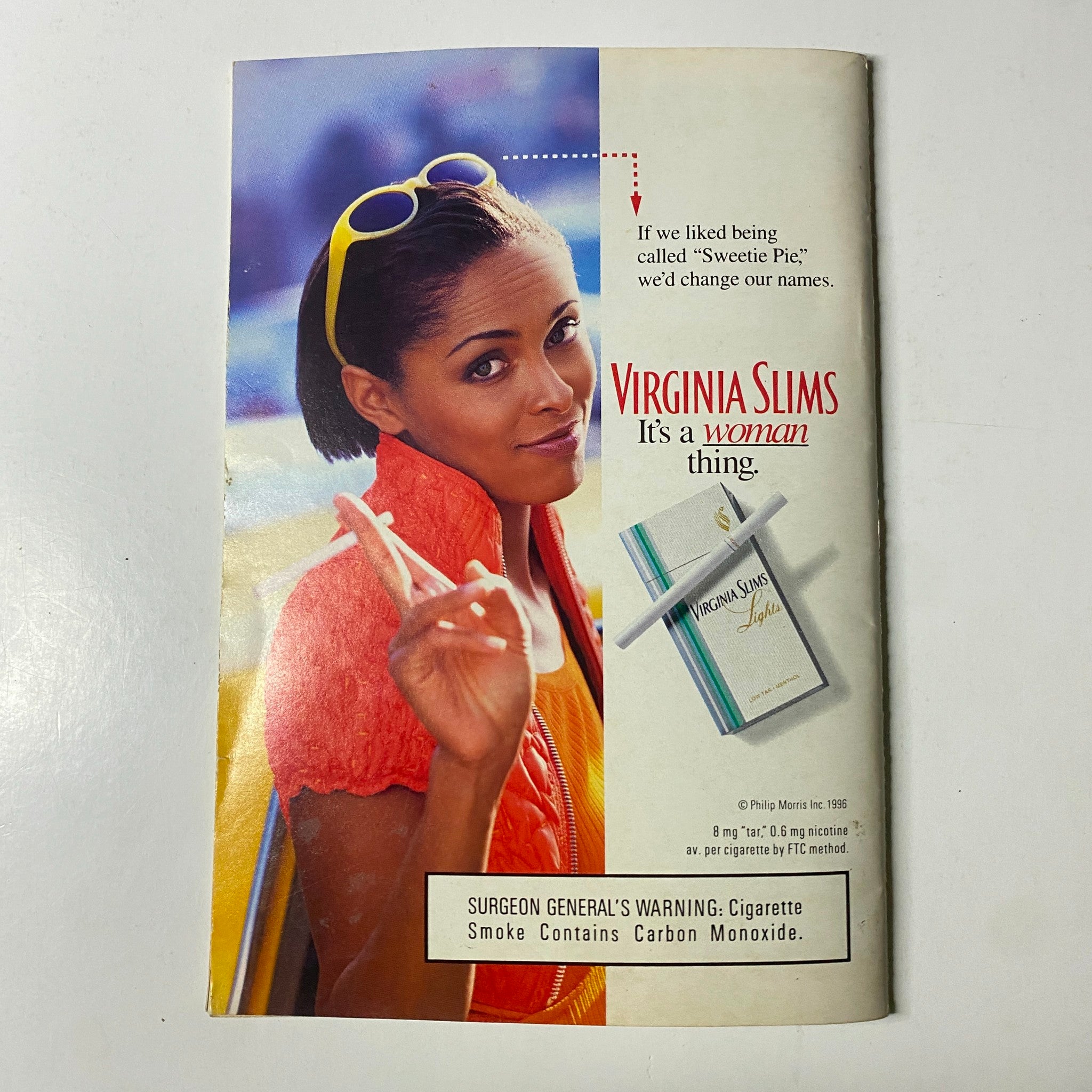 Vintage advertisement featuring a stylish woman with sunglasses promoting Virginia Slims cigarettes, with a tagline emphasizing women's empowerment. Related to Jet Magazine May 13, 1996, Vol. 89, No. 26, featuring Michael and Deloris Jordan on the cover.