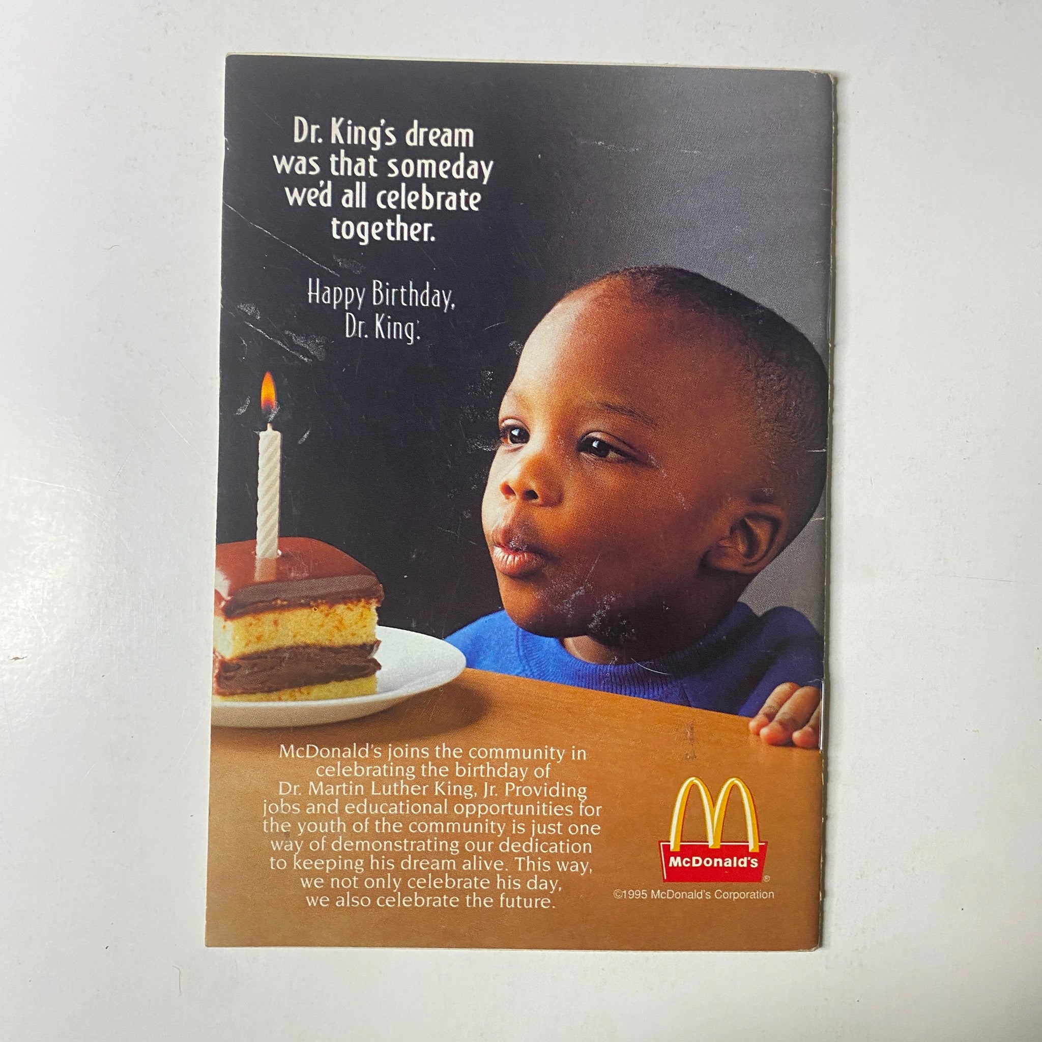 Image from Jet Magazine January 8, 1996 showcasing a commemorative birthday card for Dr. Martin Luther King Jr. from McDonald's, celebrating his legacy and contributions.