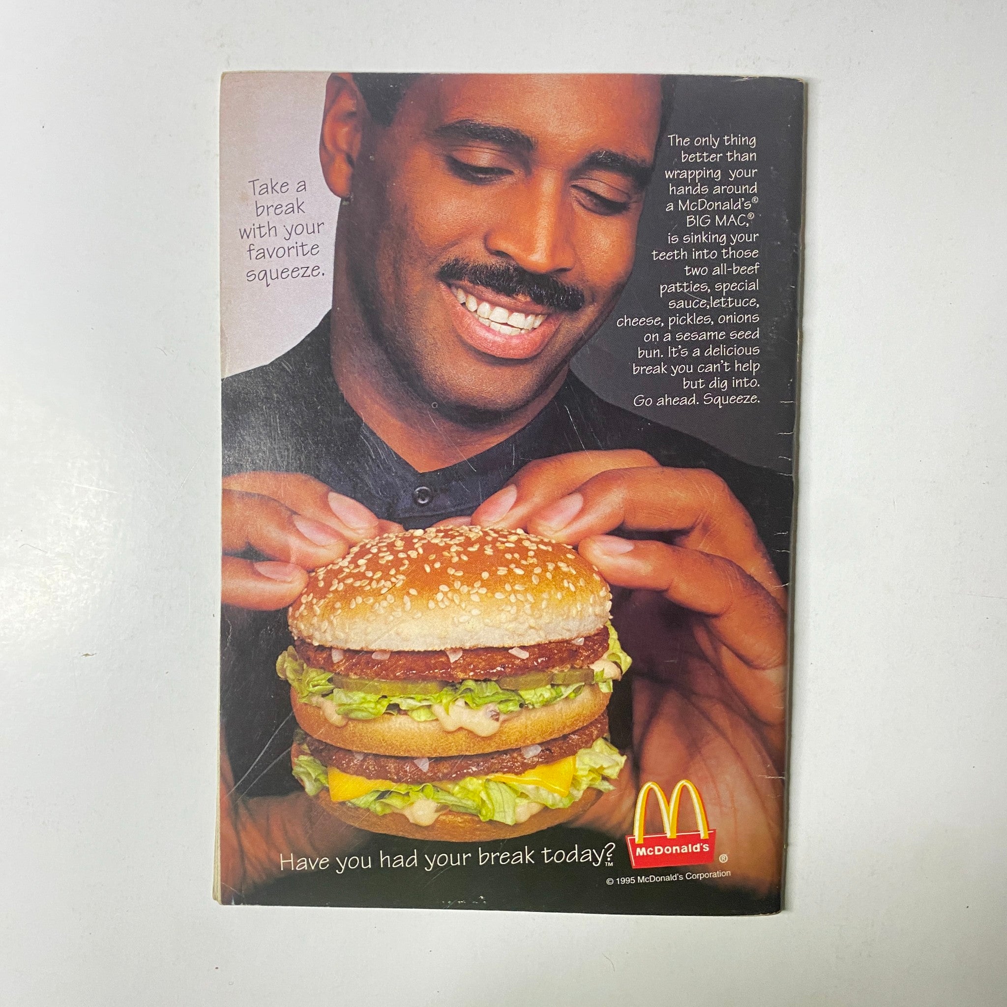 Jet Magazine December 25, 1995 - January 1, 1996 featuring a McDonald's advertisement with a man holding a large hamburger and a catchy slogan about taking a break.