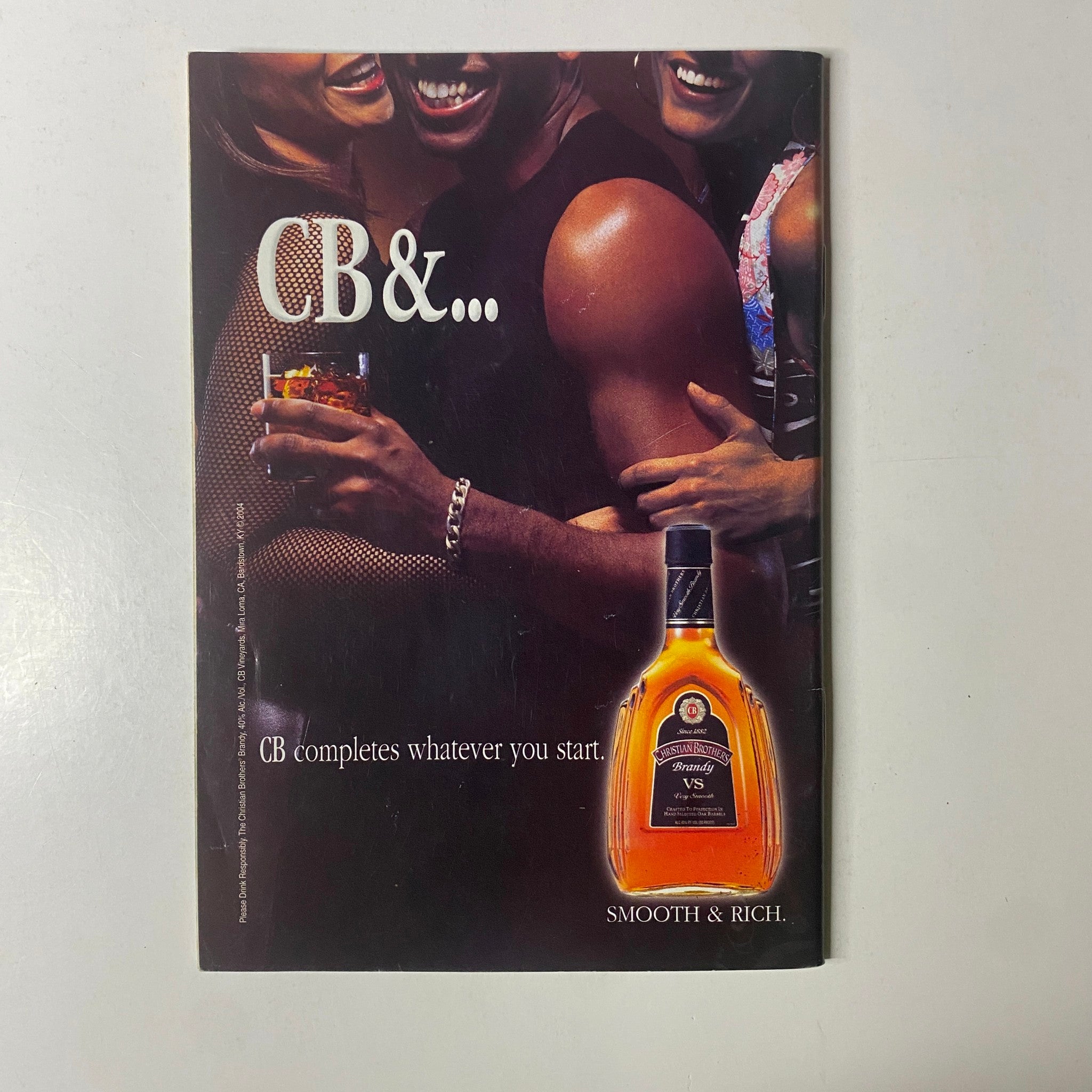Advertisement from Jet Magazine December 11, 2006, Vol. 110, No. 23 featuring CB liquor, promoting the drink as 'Smooth & Rich' with a vibrant party scene.