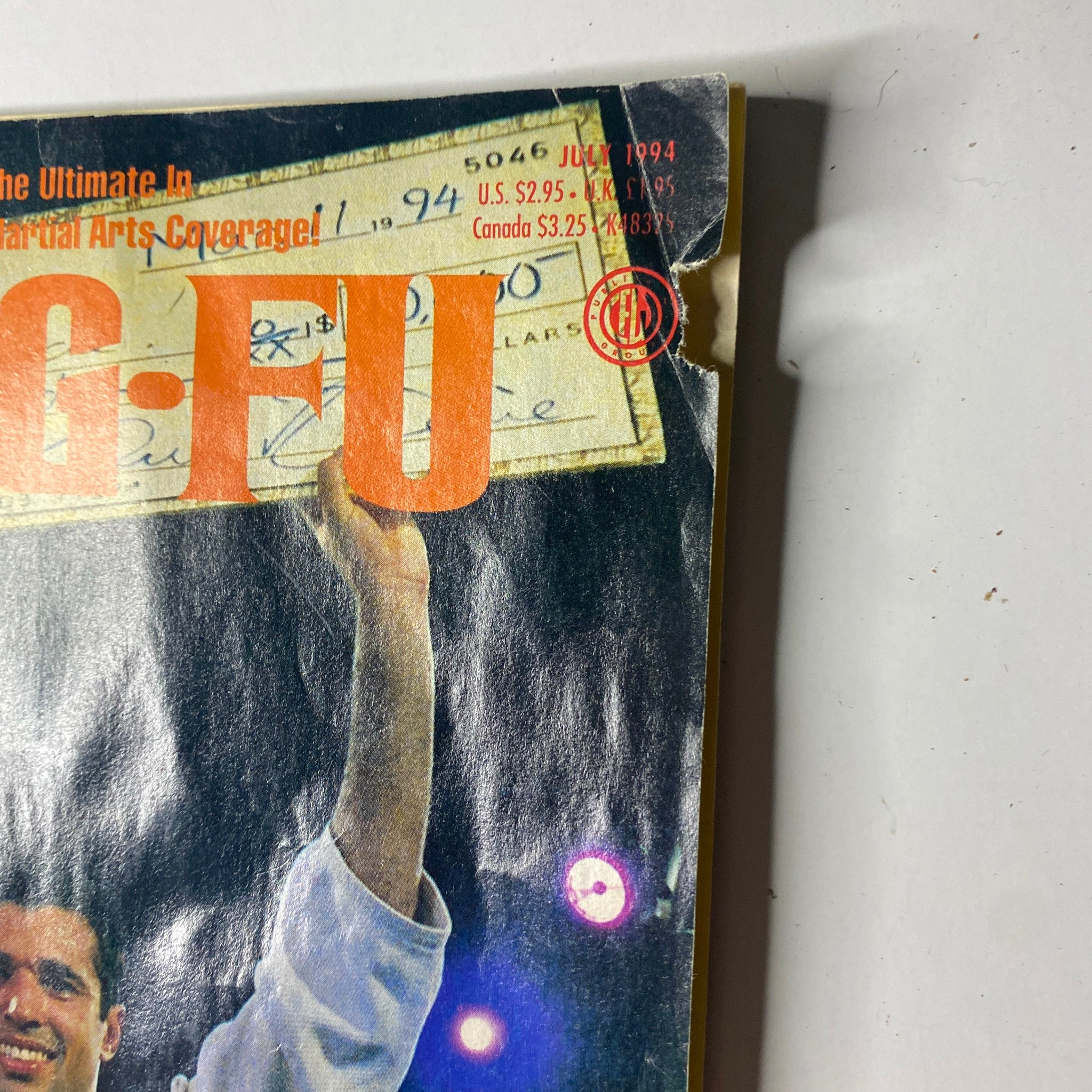 Close-up of the top corner of Inside Kung Fu Magazine from July 1994 showing the title and a tear on the cover, featuring Royce Gracie.