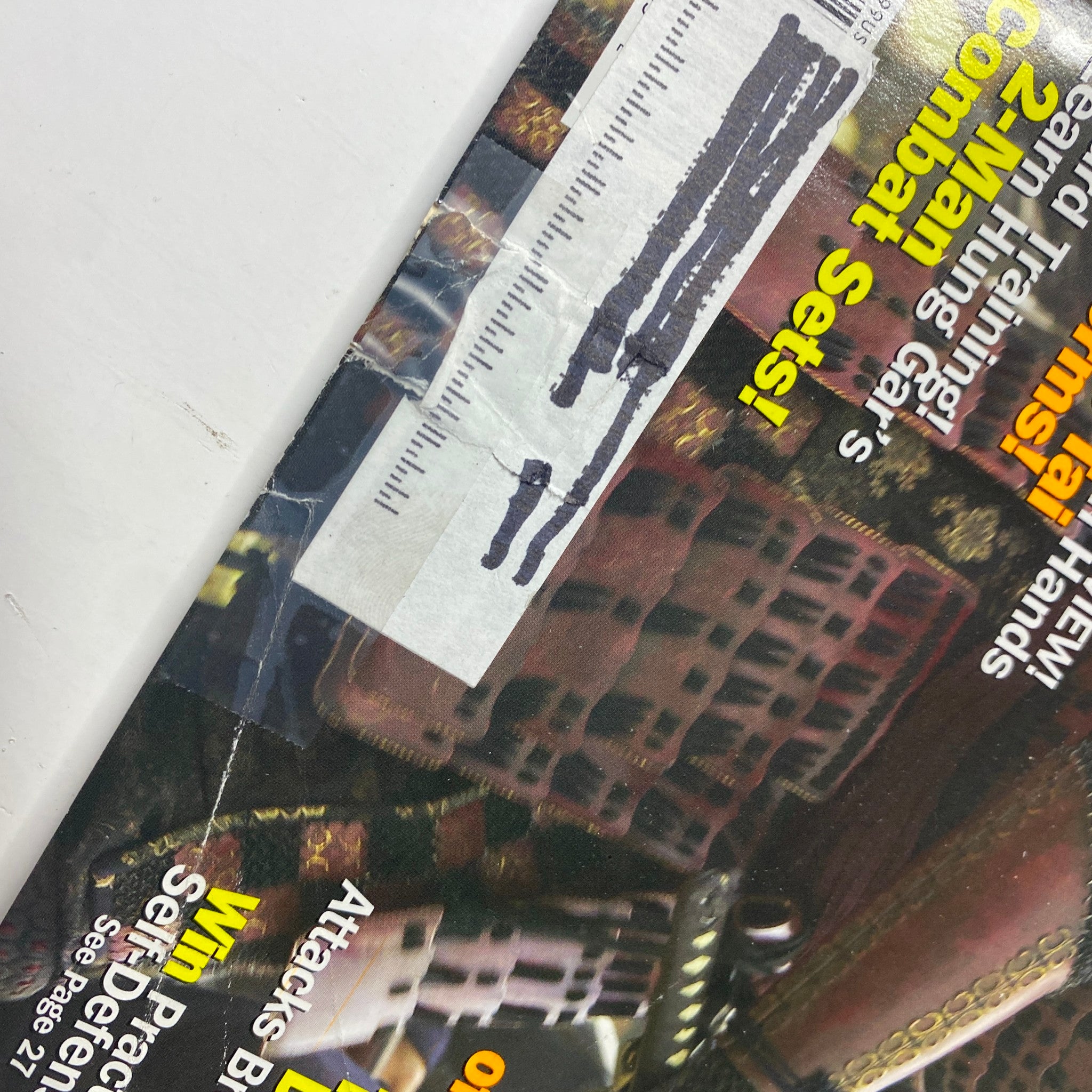 Close-up of the side of Inside Kung Fu Magazine, January 2004, showing a glimpse of the cover and cut-off titles.