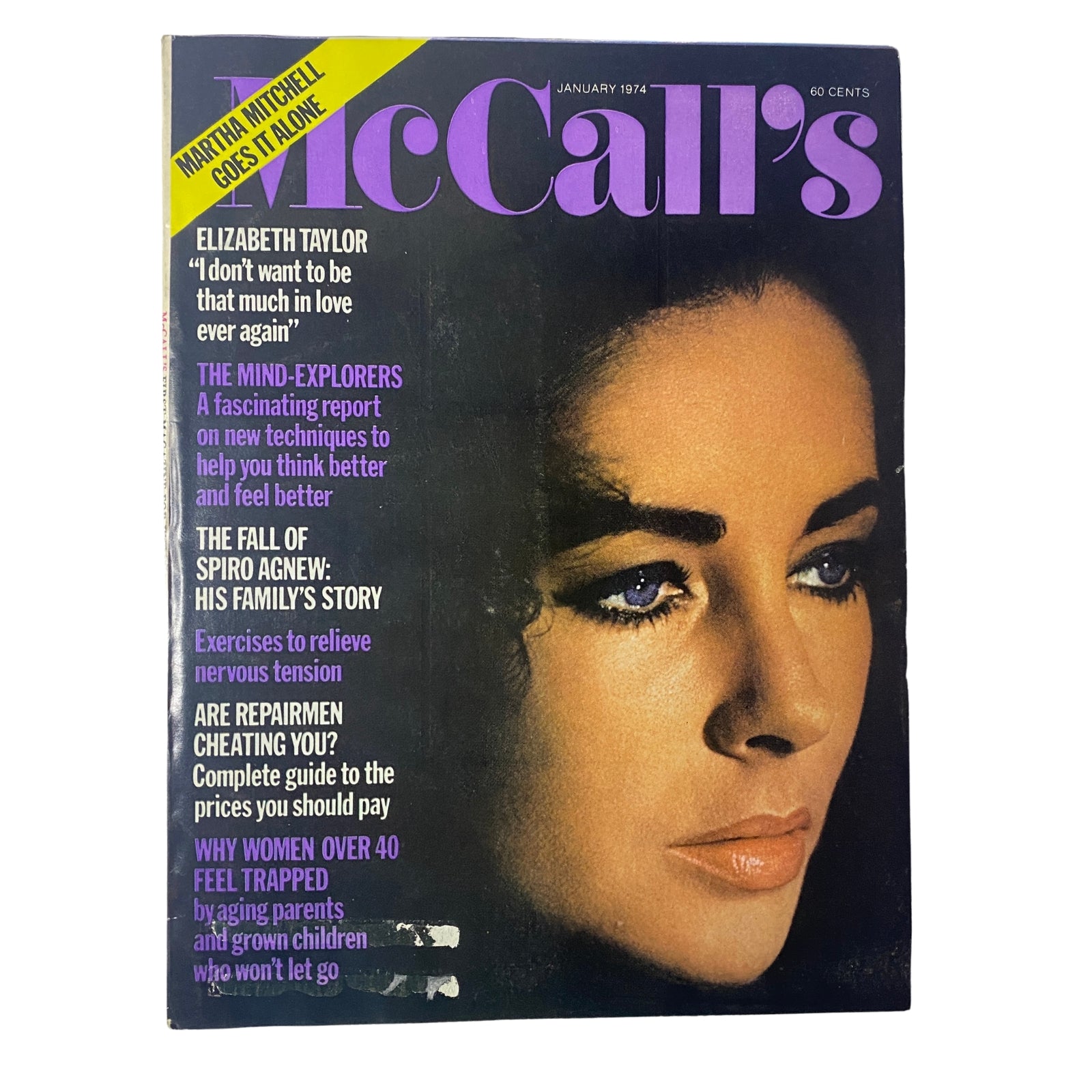 Cover of McCall’s Magazine January 1974, Volume 101, Number 4 featuring Elizabeth Taylor. The cover includes a headline about her intimate interview expressing, 'I don’t want to be that much in love ever again.' Other notable sections are highlighted, including articles like 'Martha Mitchell Goes It Alone' and 'The Mind Explorers.' This magazine is in very good condition without a mailing label.