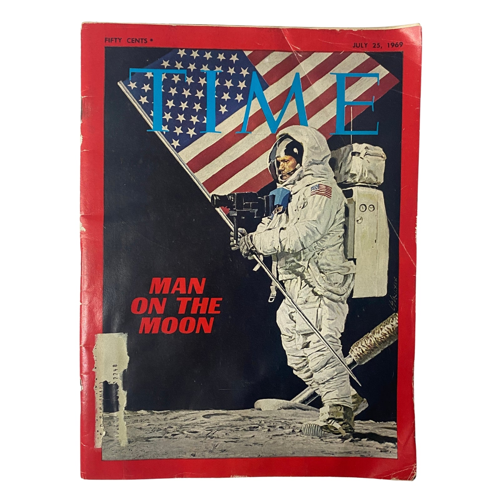Time Magazine cover from July 25, 1969 featuring 'Man on the Moon' with astronaut standing on lunar surface holding an American flag, commemorating the Apollo 11 mission.