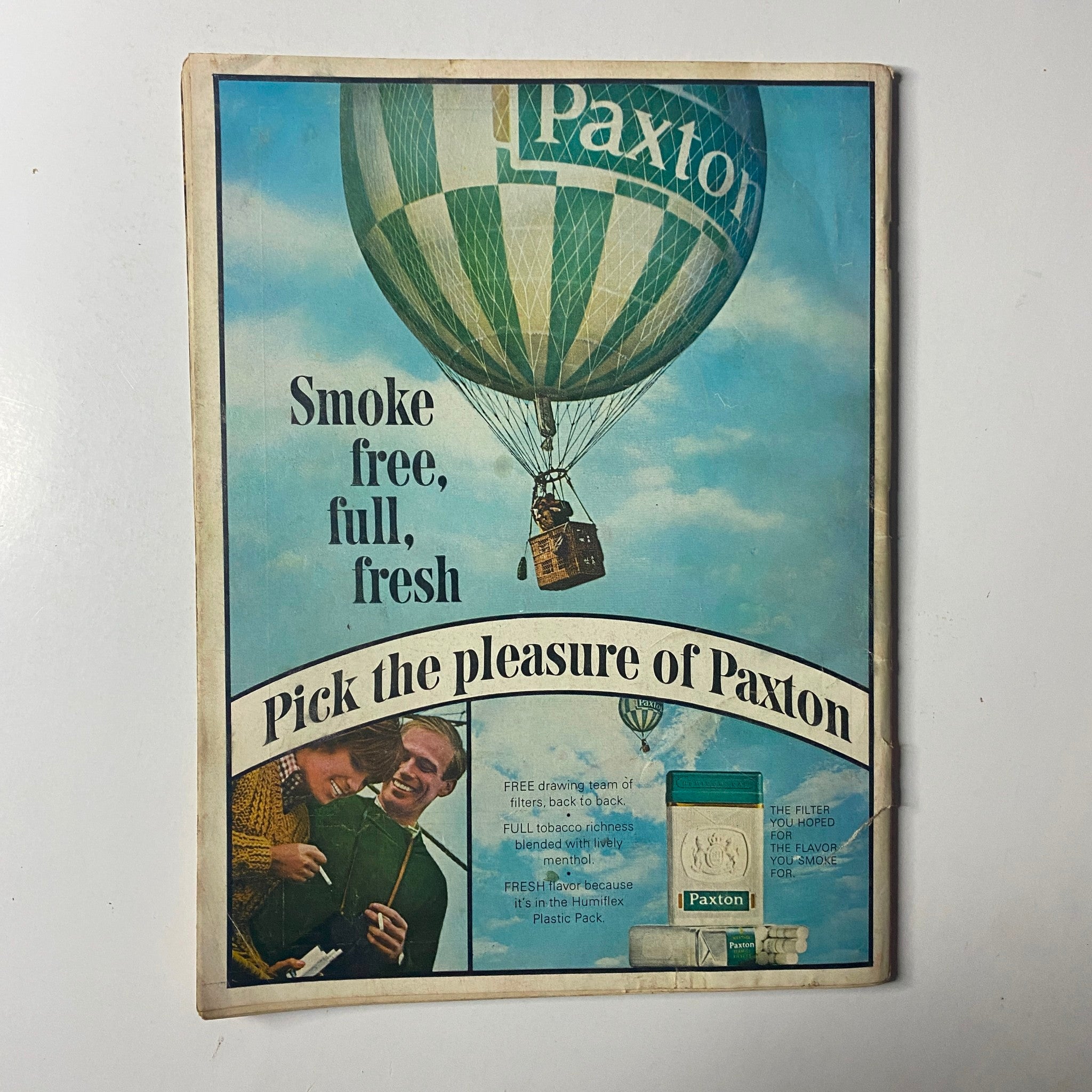 Back cover of Time Magazine November 29, 1963 Vol 82 No. 22 promoting Paxton cigarettes with a colorful advertisement featuring a hot air balloon, emphasizing the era's marketing style.
